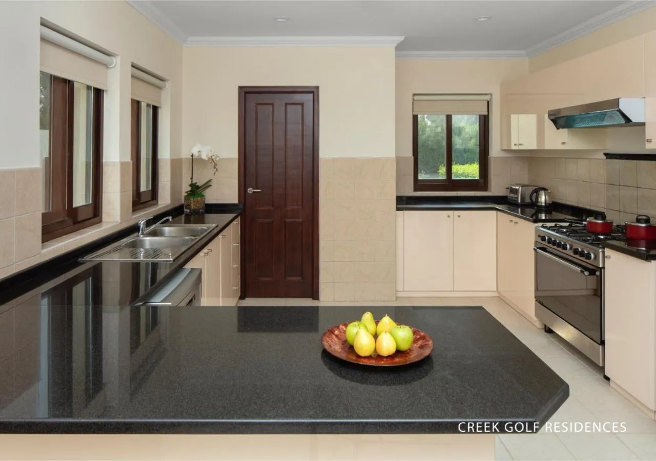 Kitchen or kitchenette in Elara & Golf Villas - curated by Park Hyatt Dubai