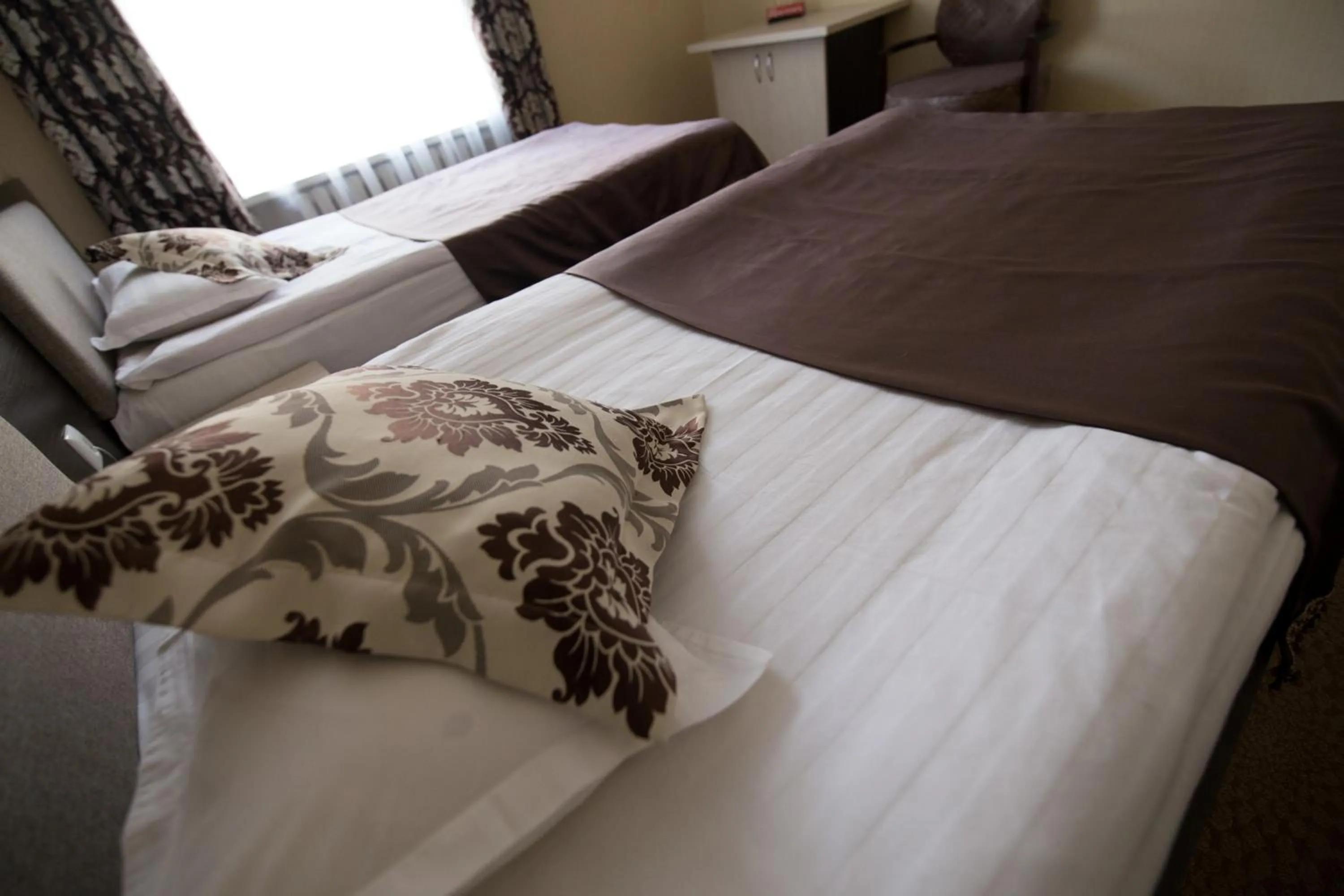 Bed in Renion Zyliha Hotel