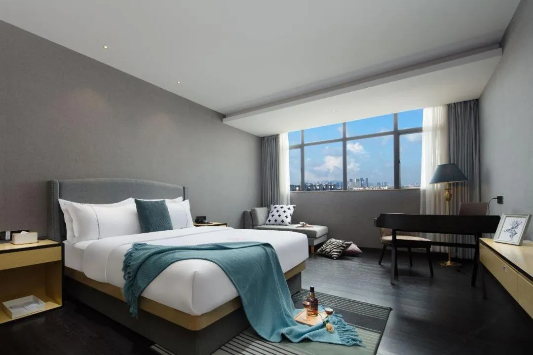 Photo of the whole room, Bed in Guangzhou Mustin Hotel