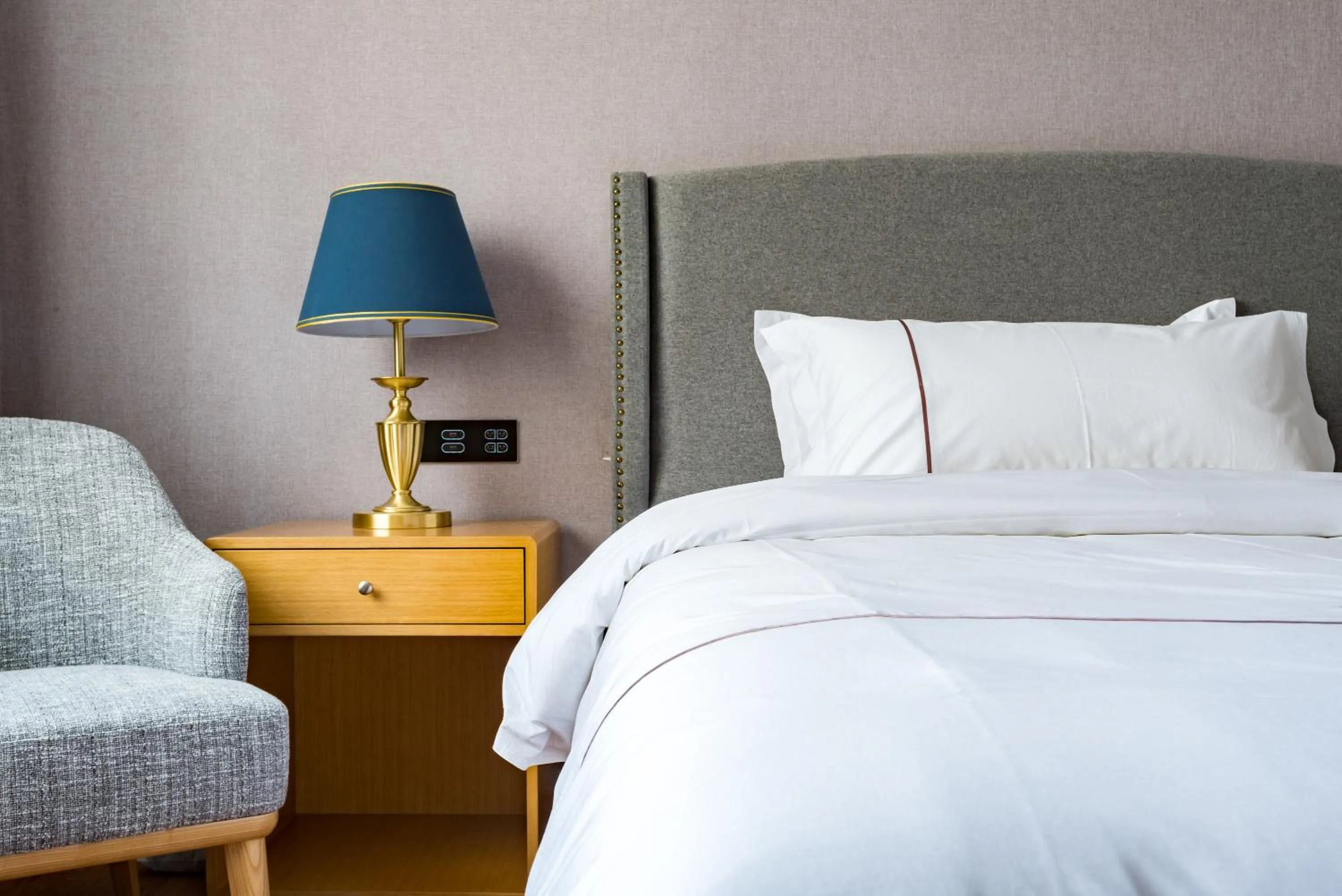 Bed in Guangzhou Mustin Hotel