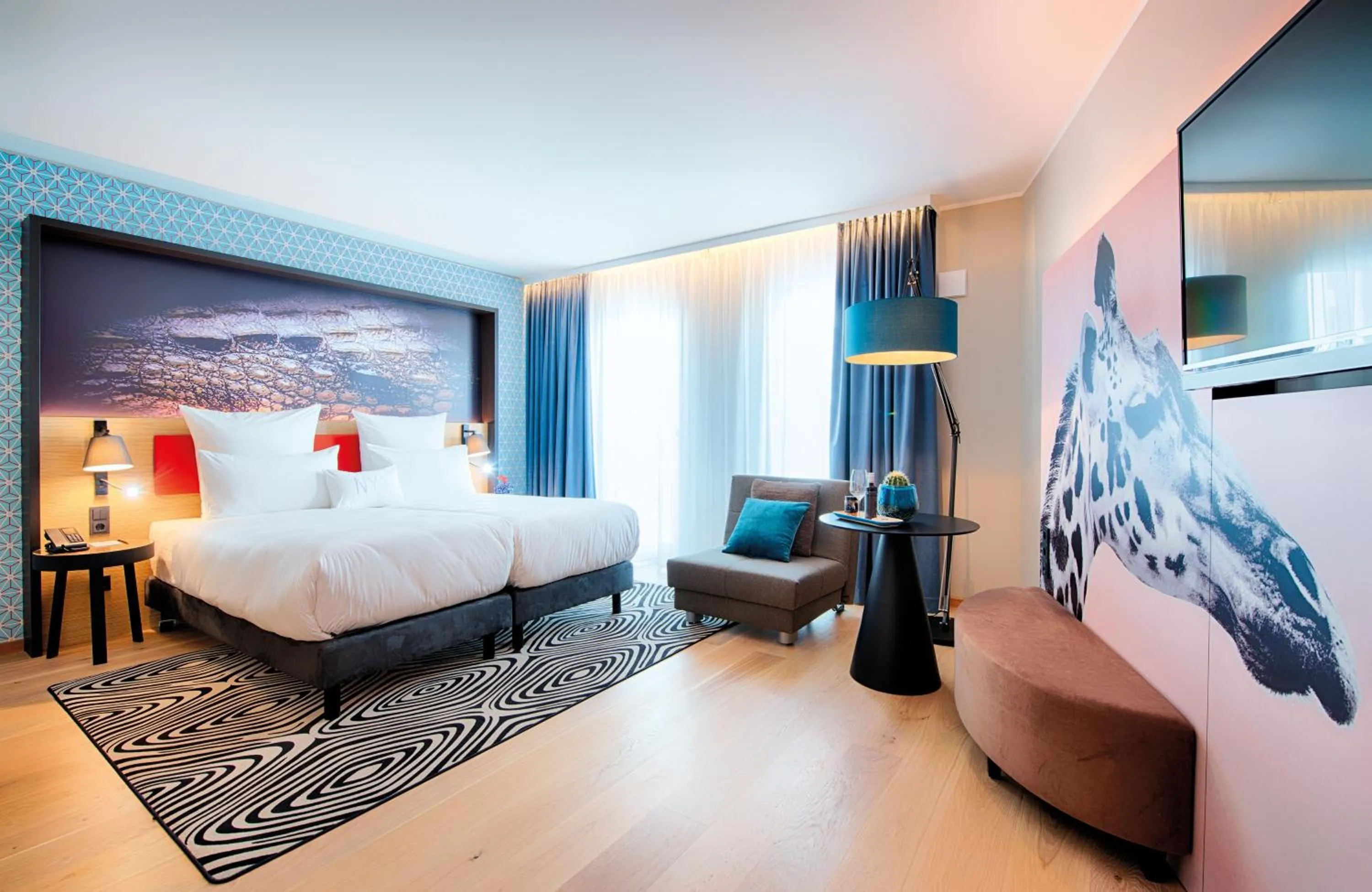 Photo of the whole room, Bed in NYX Hotel Munich by Leonardo Hotels