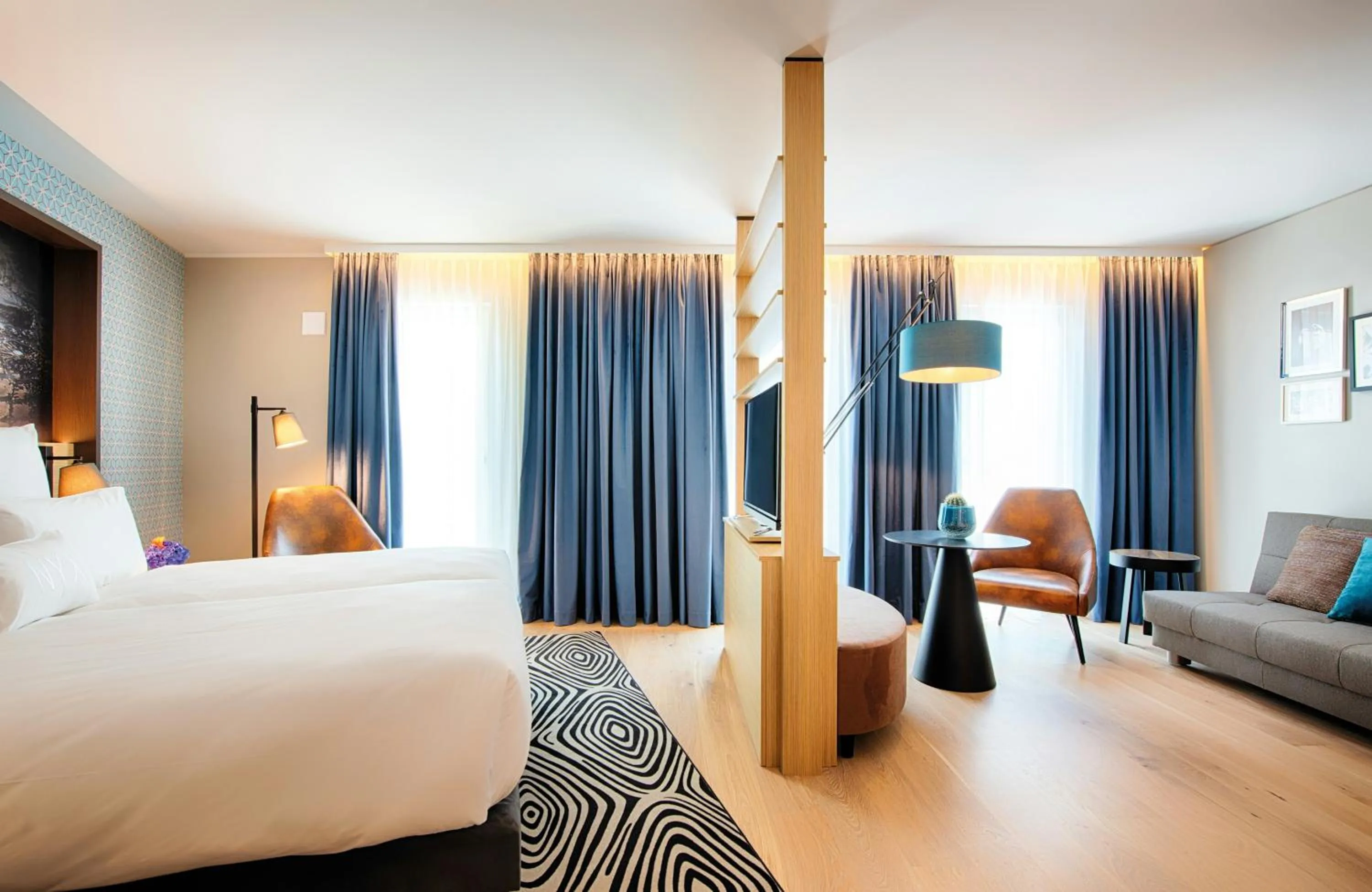 Photo of the whole room, Bed in NYX Hotel Munich by Leonardo Hotels