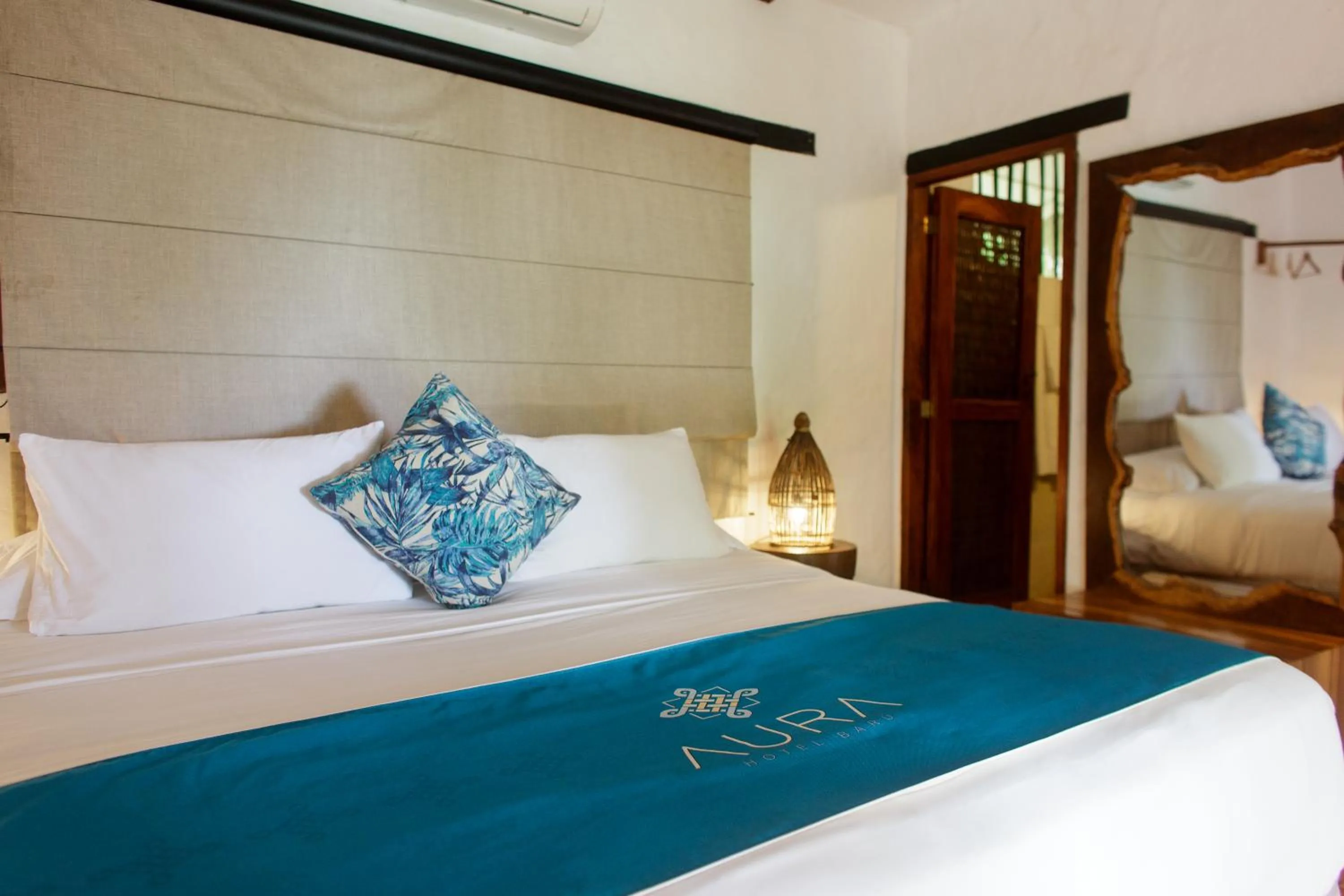 Bed in Aura Hotel Barú