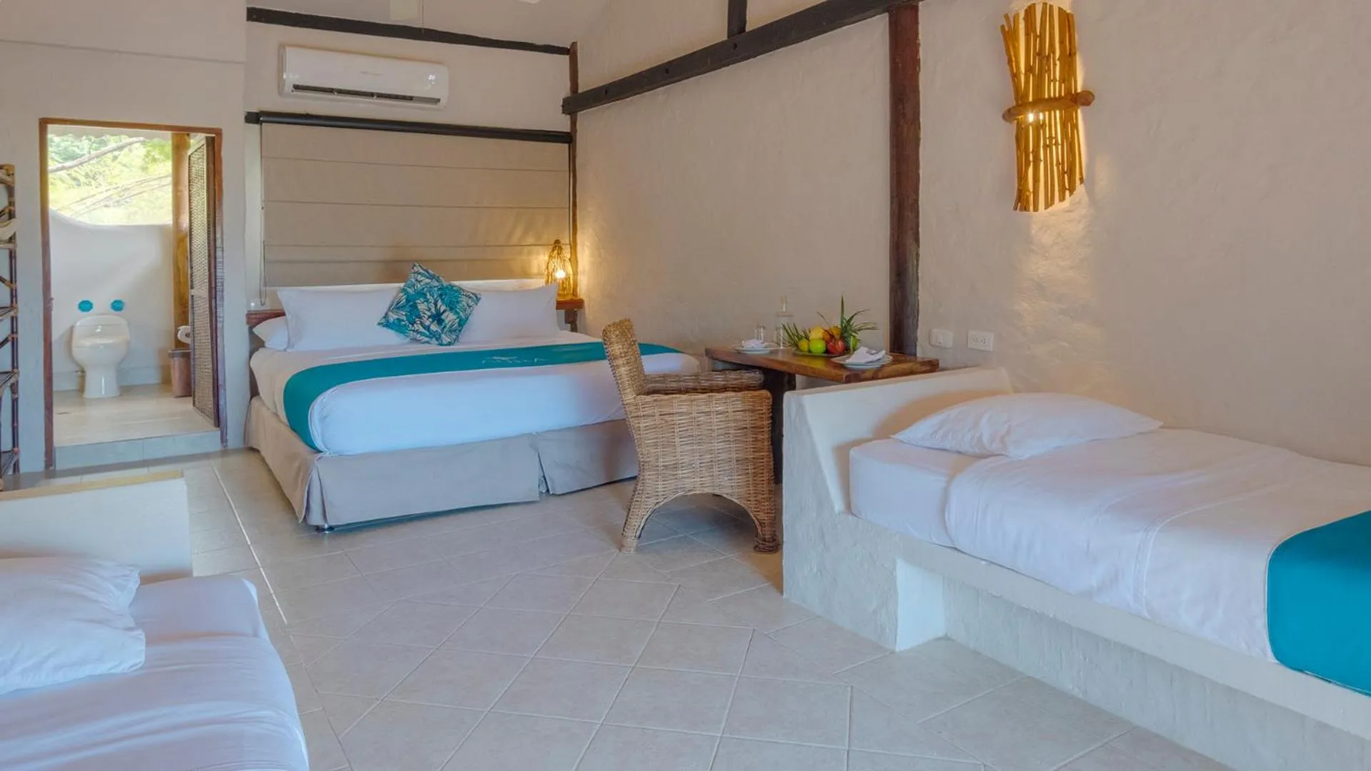 Bed in Aura Hotel Barú