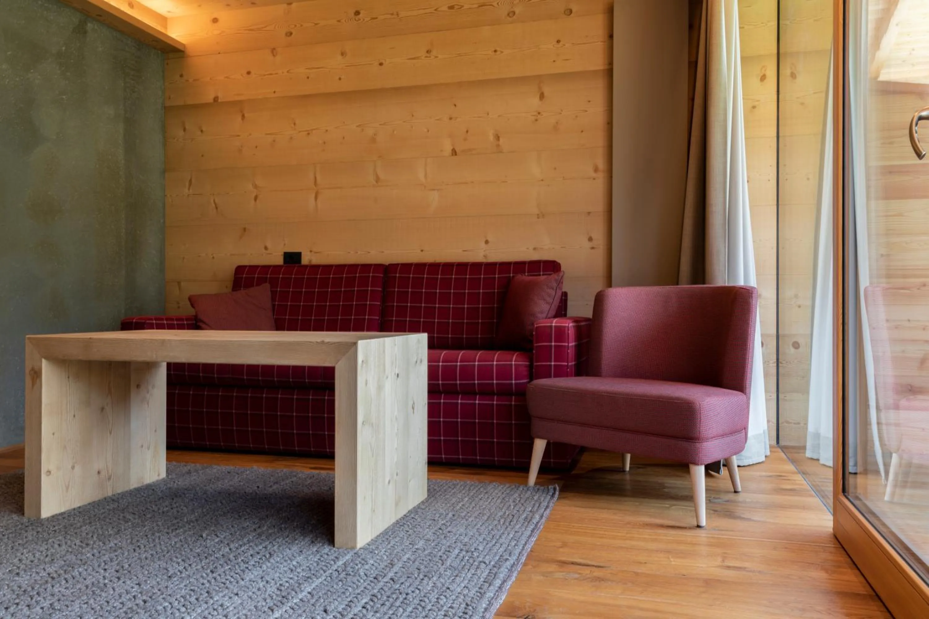 Living room in Dolomiti Lodge Alverà