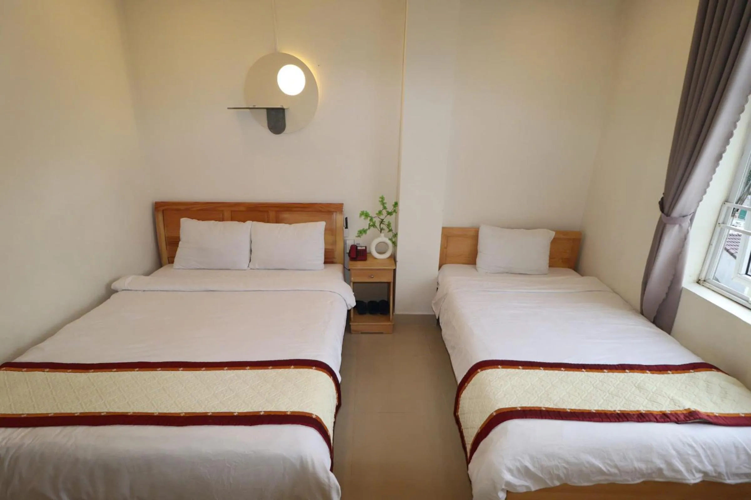 Bed in Mai Hoang Da Lat Hotel