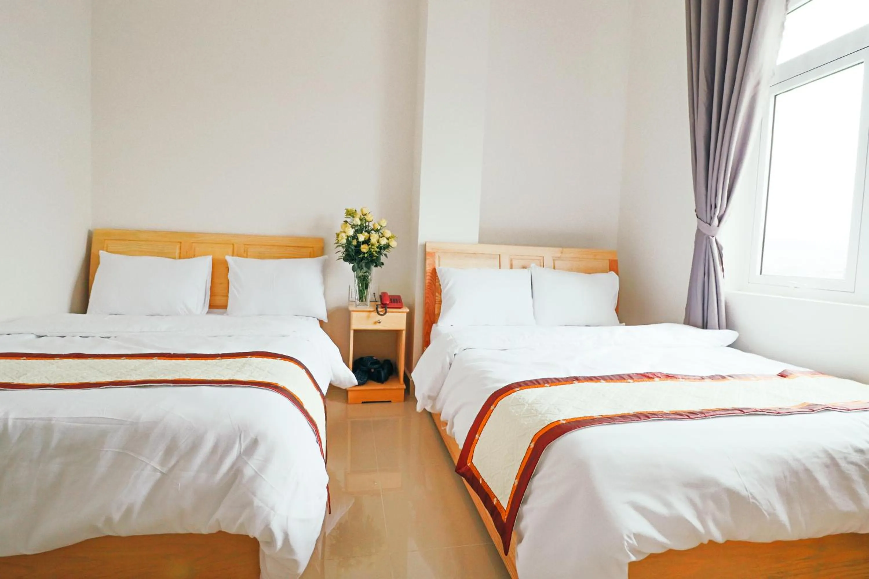 Bed in Mai Hoang Da Lat Hotel