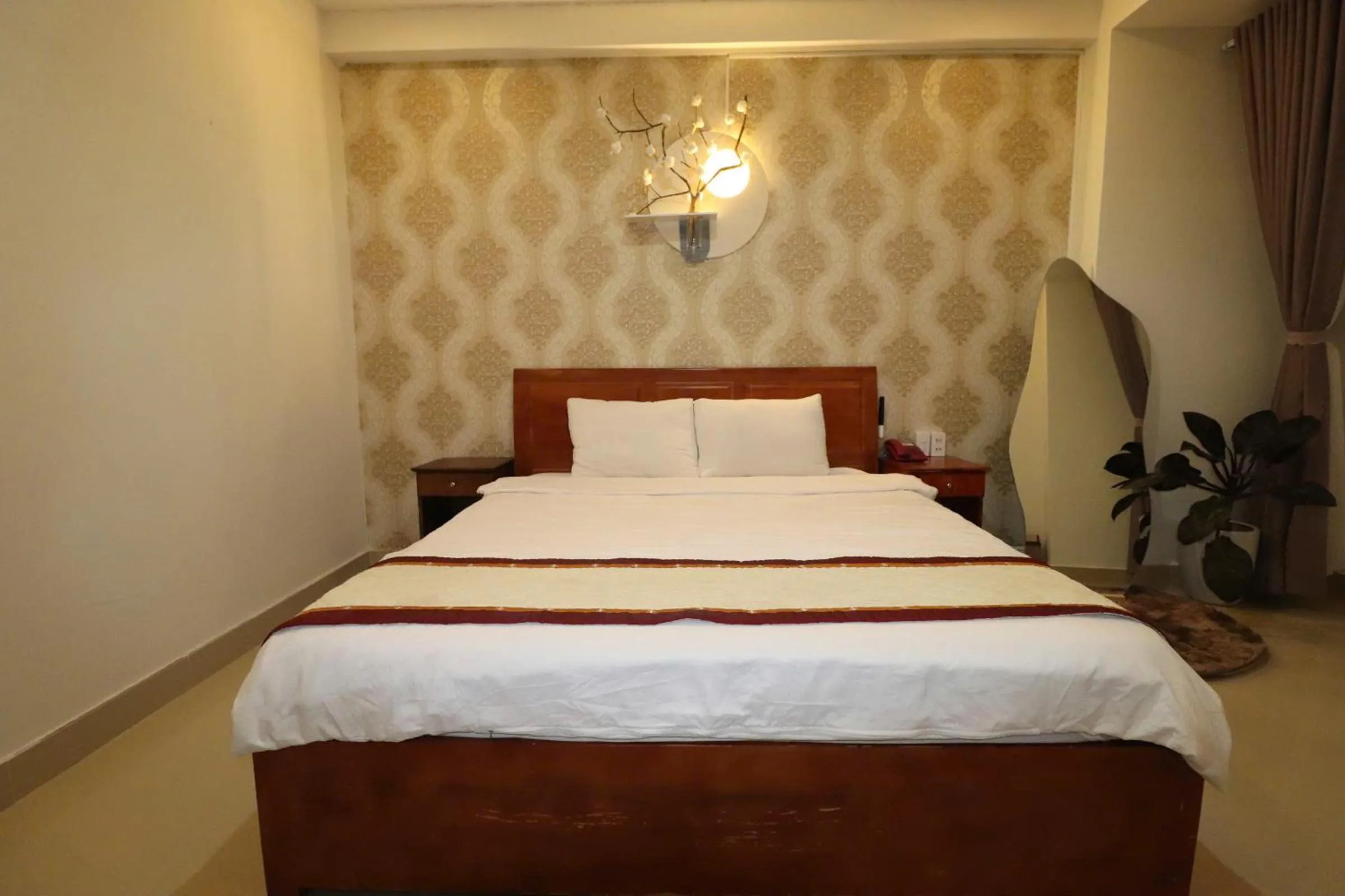 Bed in Mai Hoang Da Lat Hotel
