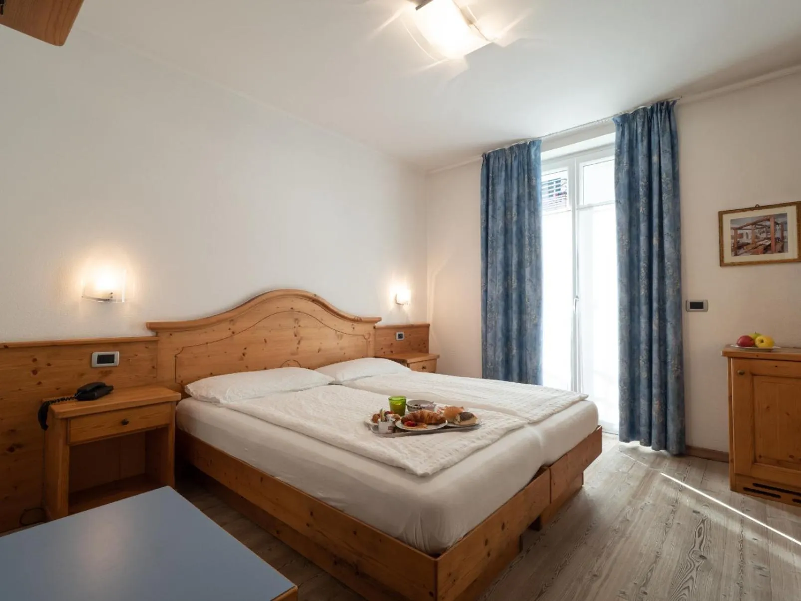 Bed in Hotel Garni Sottobosco