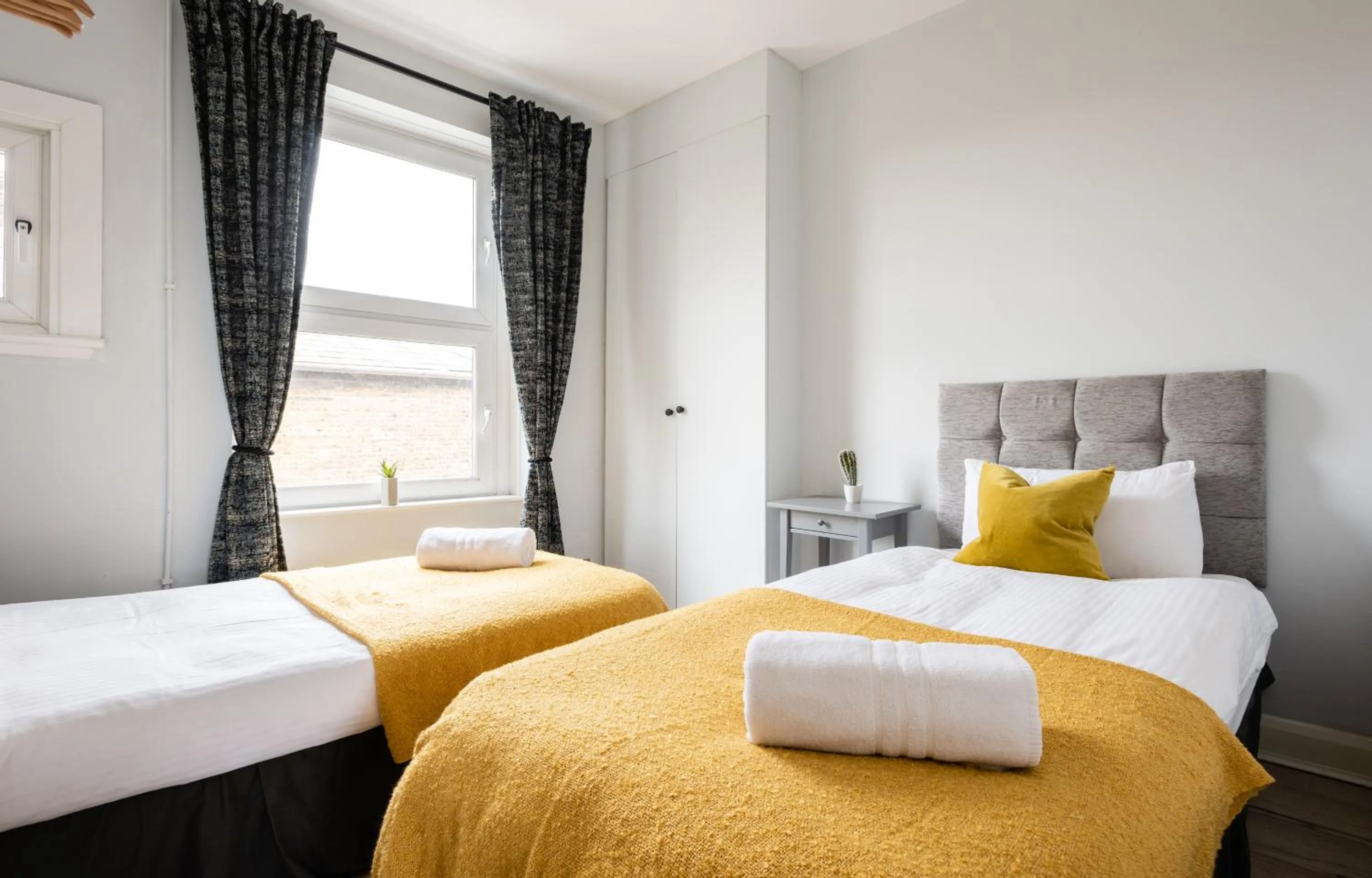 Bed in The Love Walk Apartments