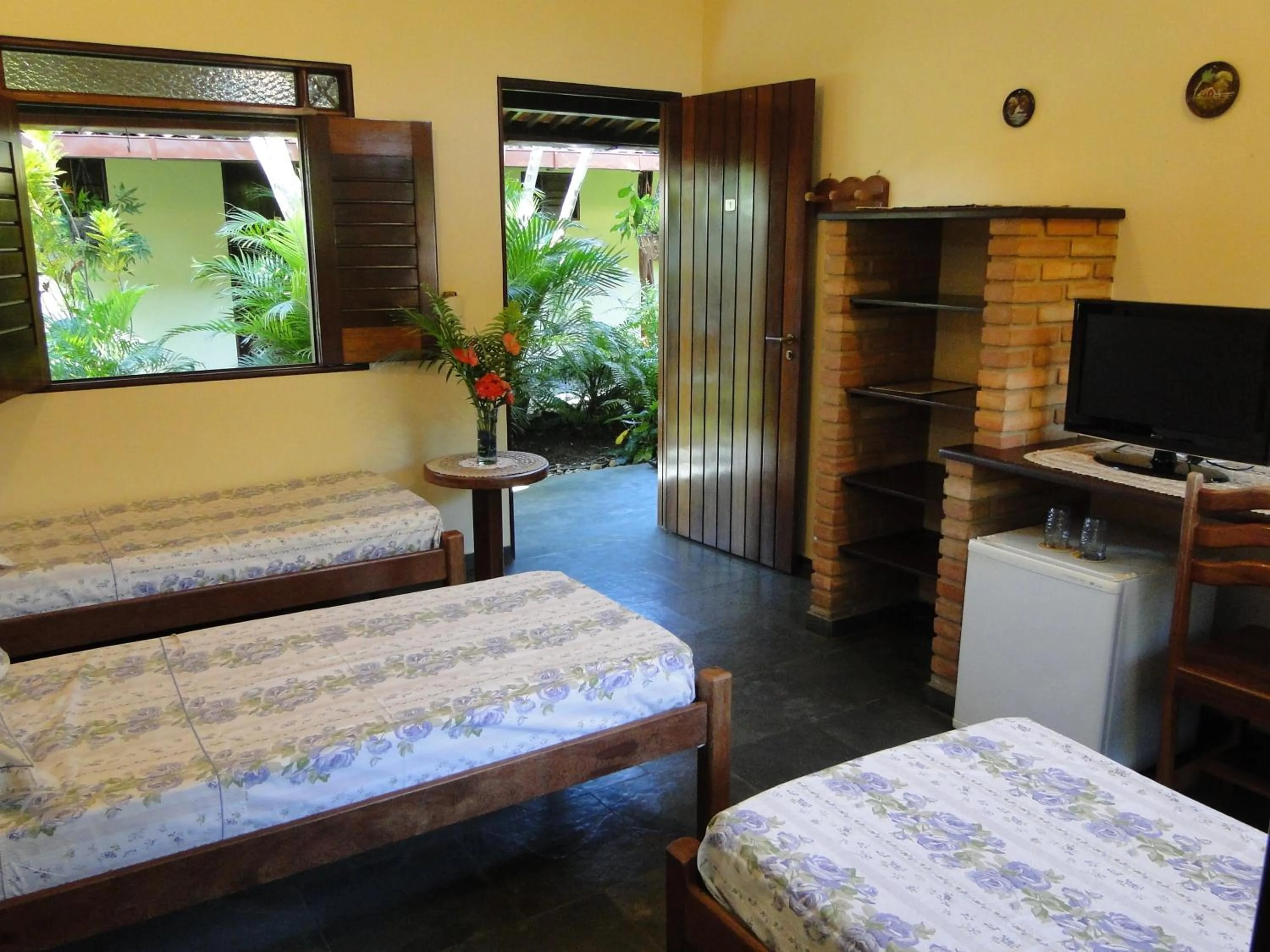 Bed in Hotel Pousada Arco Iris