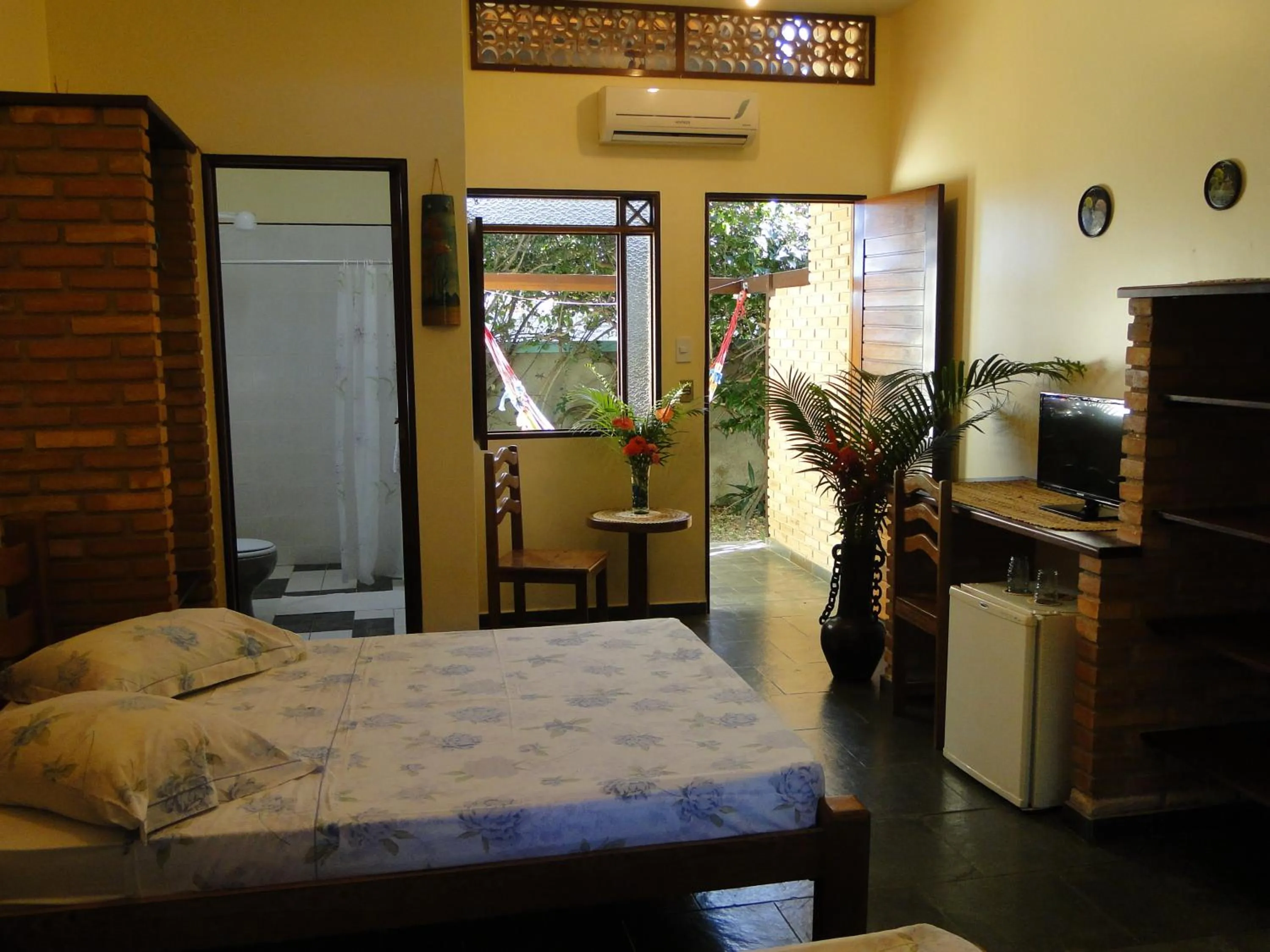 Day, Bed in Hotel Pousada Arco Iris