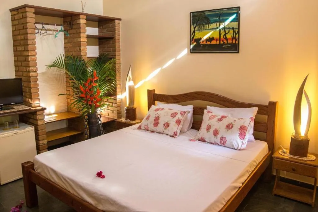 Bed in Hotel Pousada Arco Iris