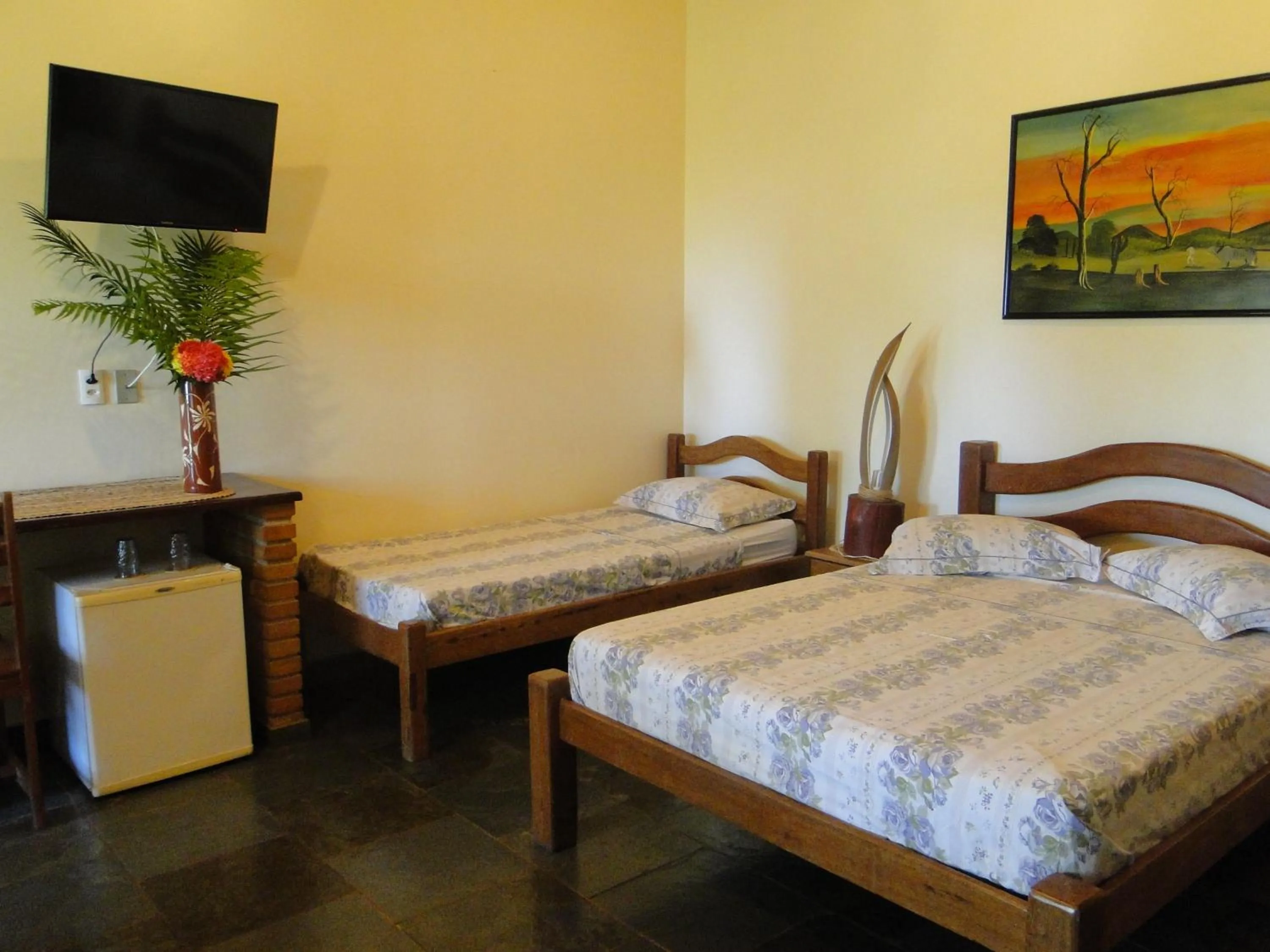 Bed in Hotel Pousada Arco Iris