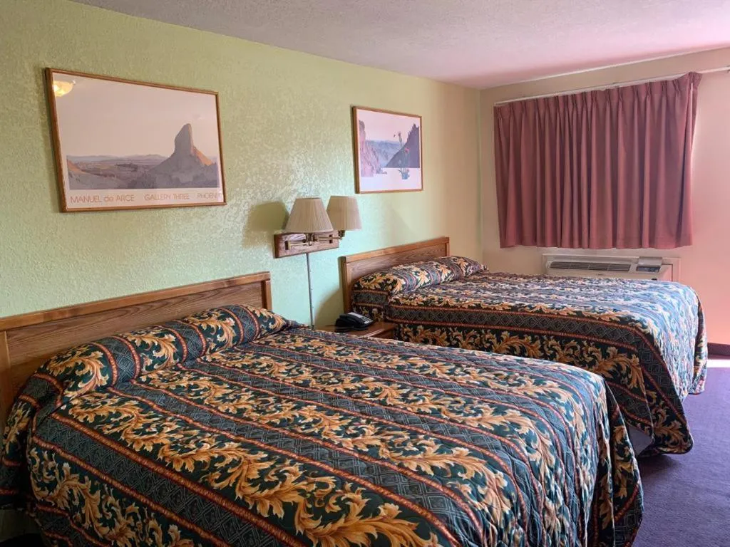 Bed in Western Motel