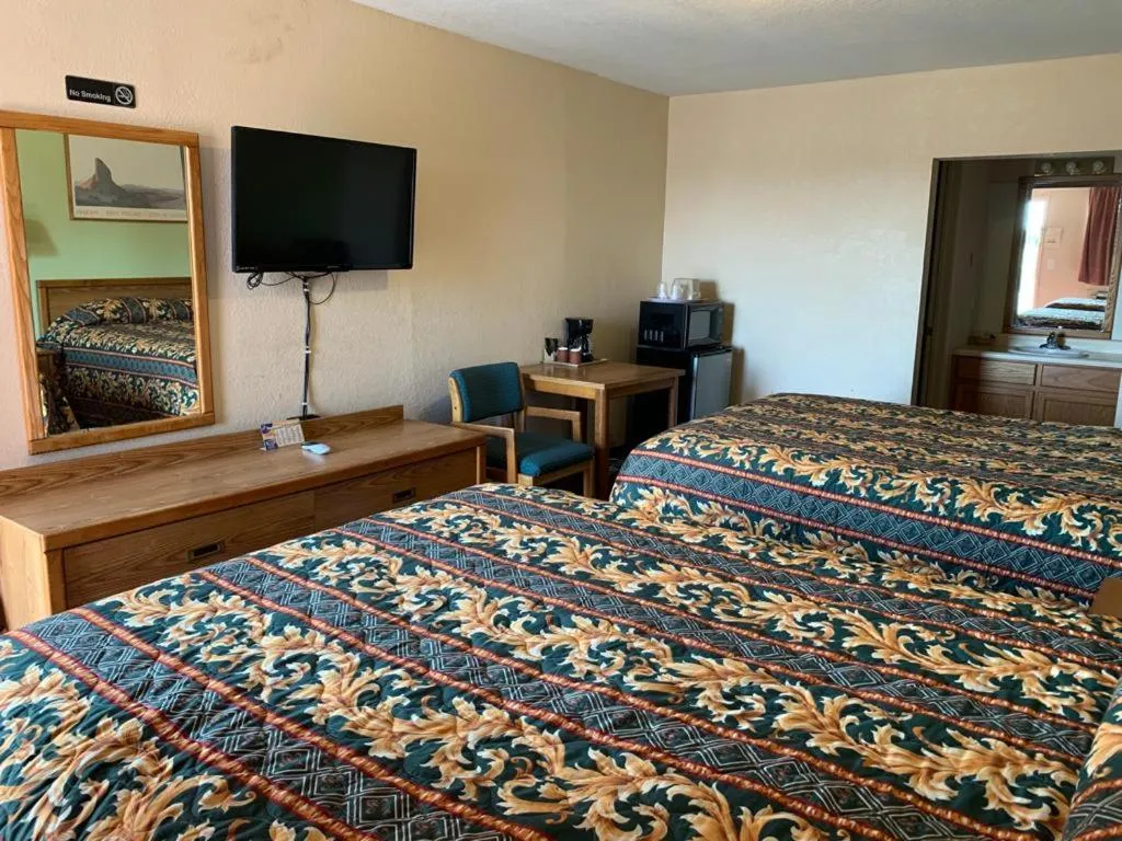 Bed in Western Motel