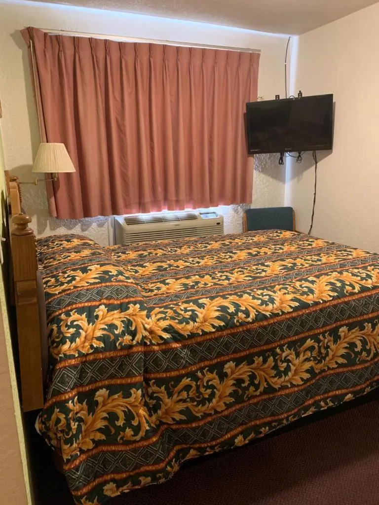 Bed in Western Motel