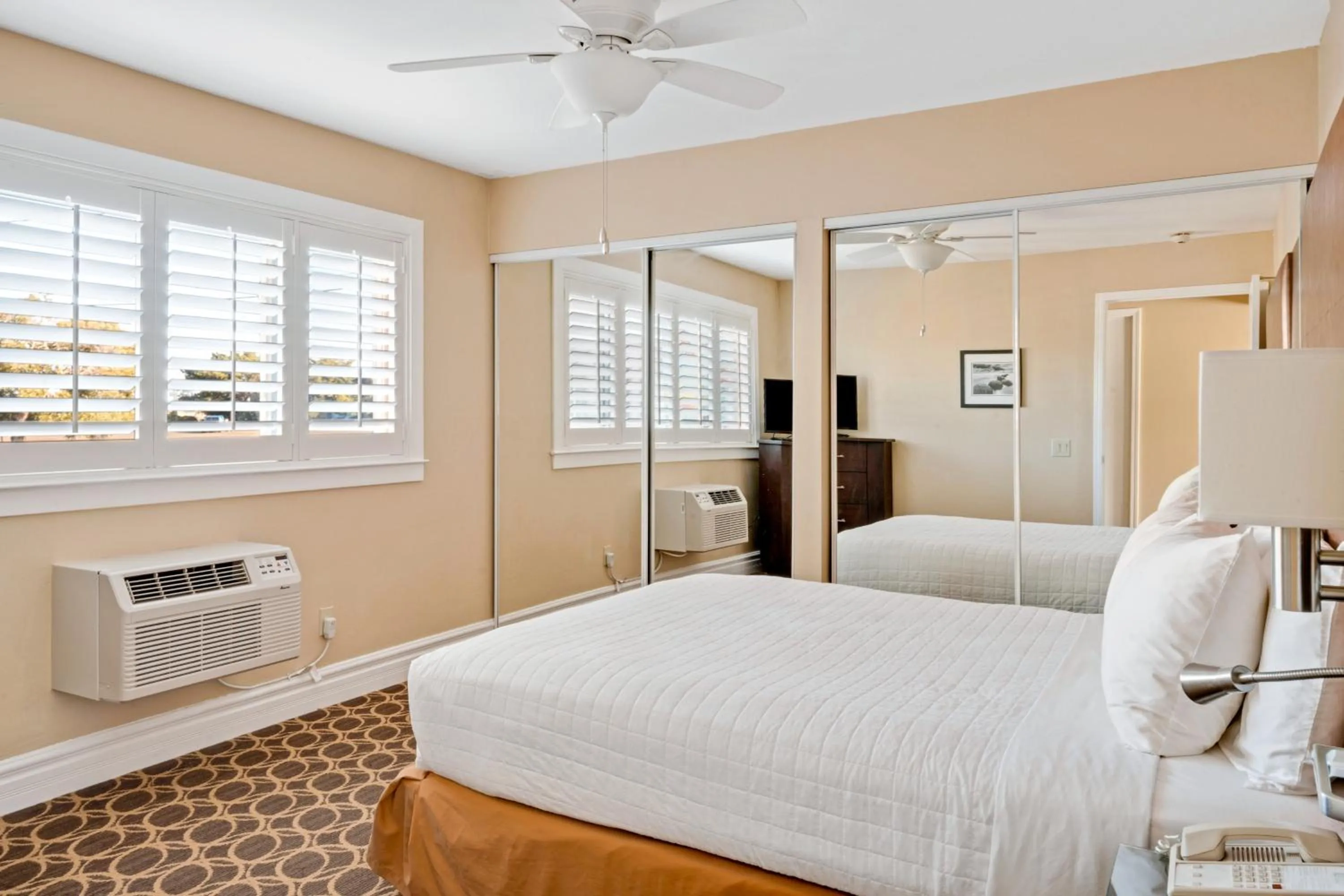 Bed in Marin Suites Hotel