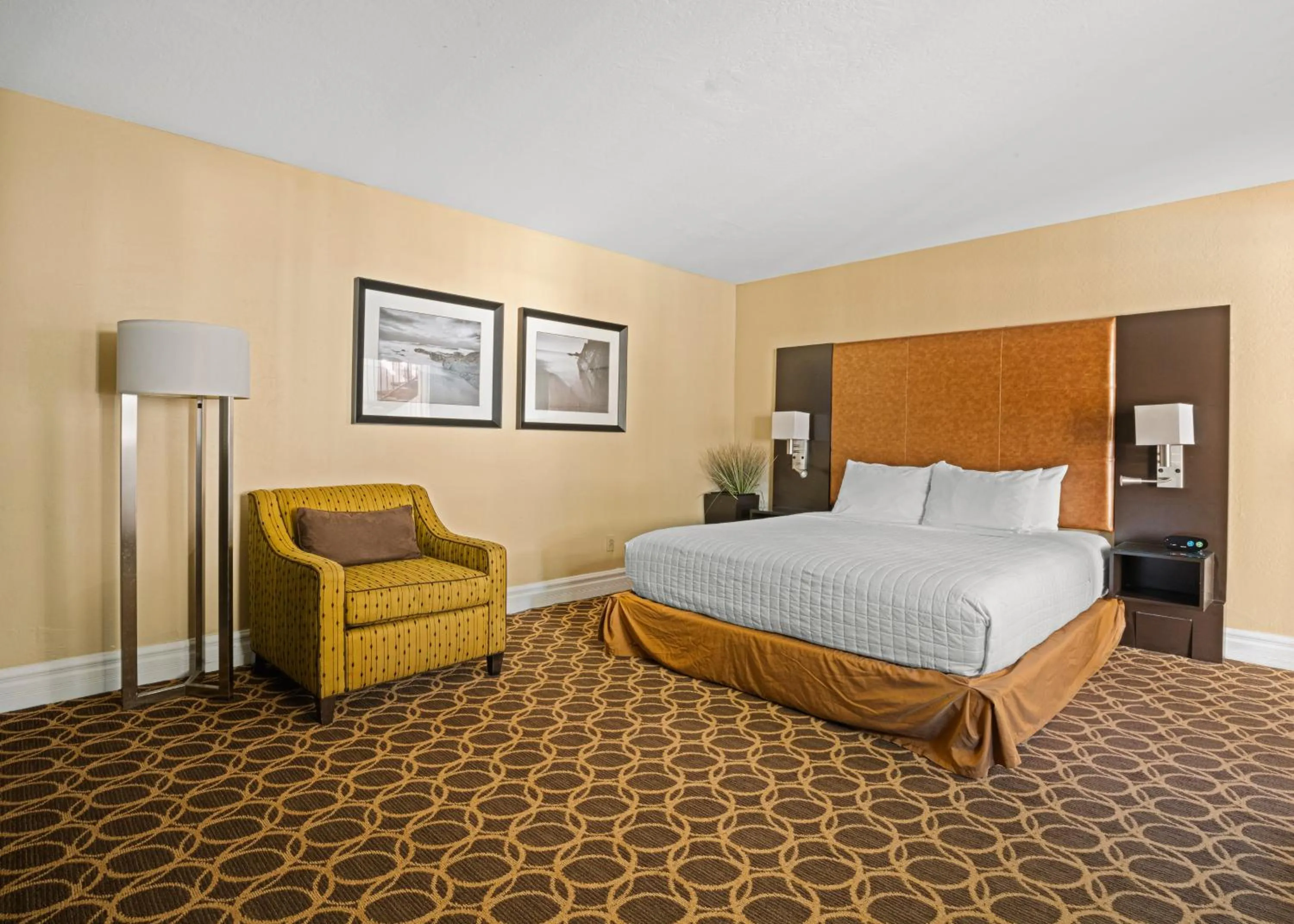 Bed in Marin Suites Hotel