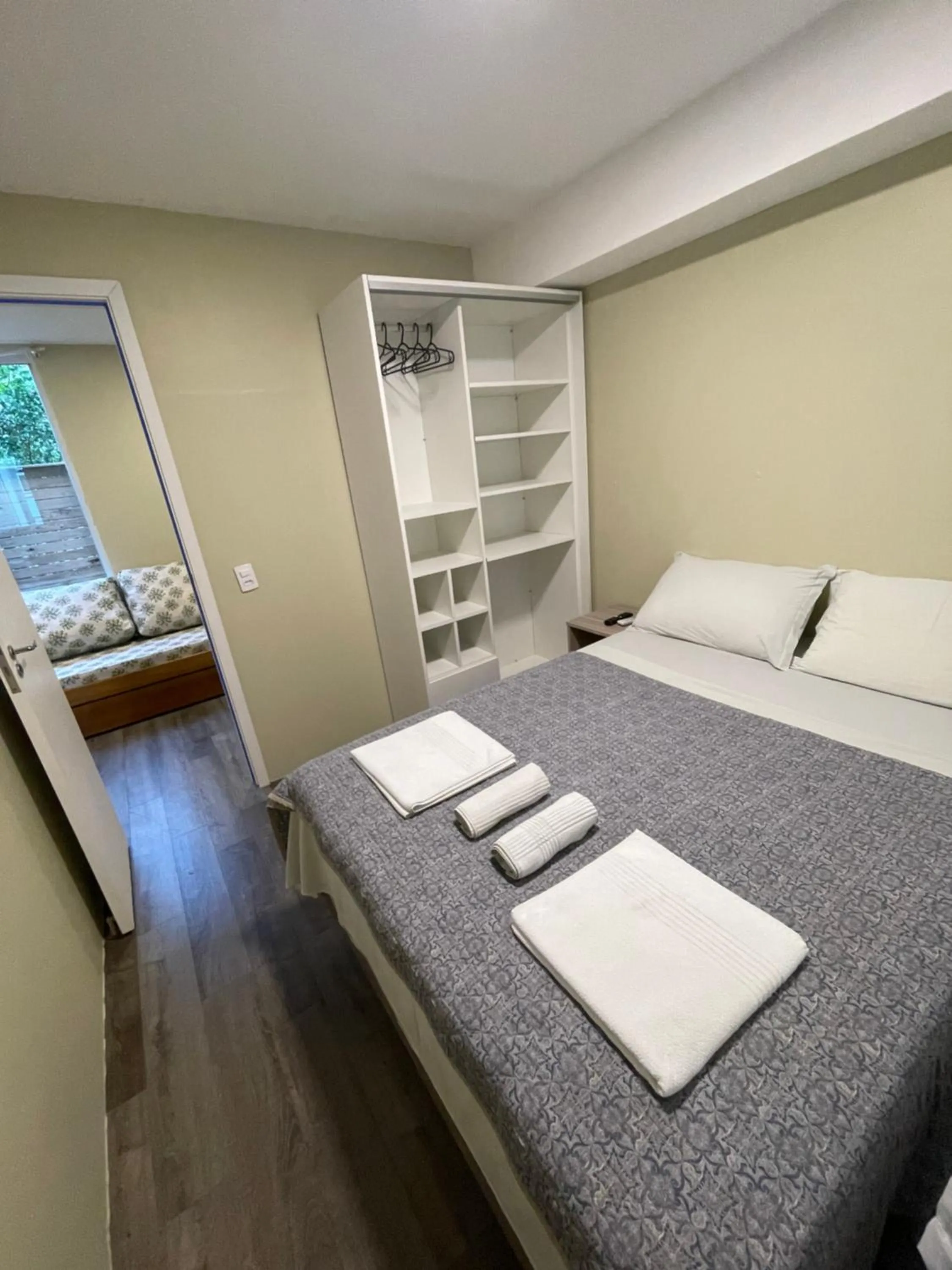 Bed in Pousada Tissiano