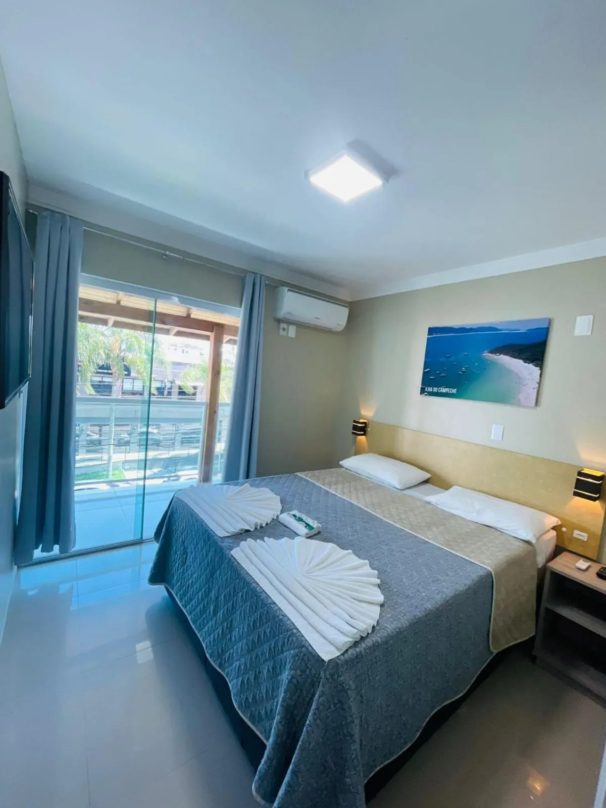 Bed in Pousada Tissiano