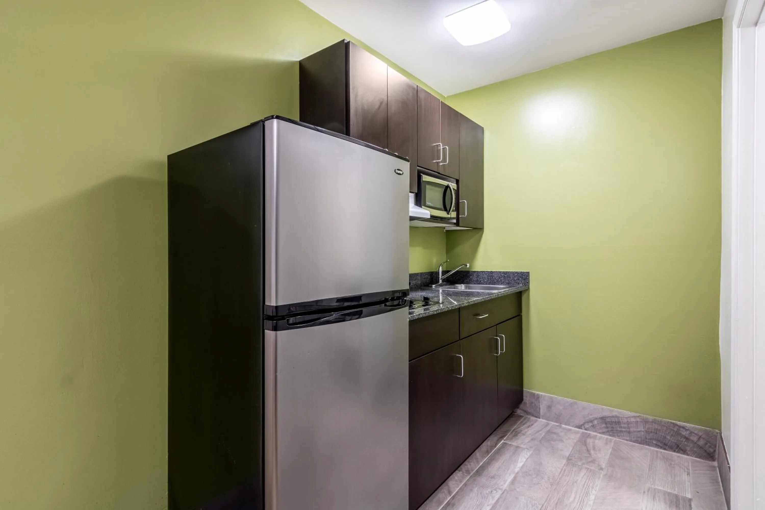 Kitchen or kitchenette in Studio 6-Savannah, GA