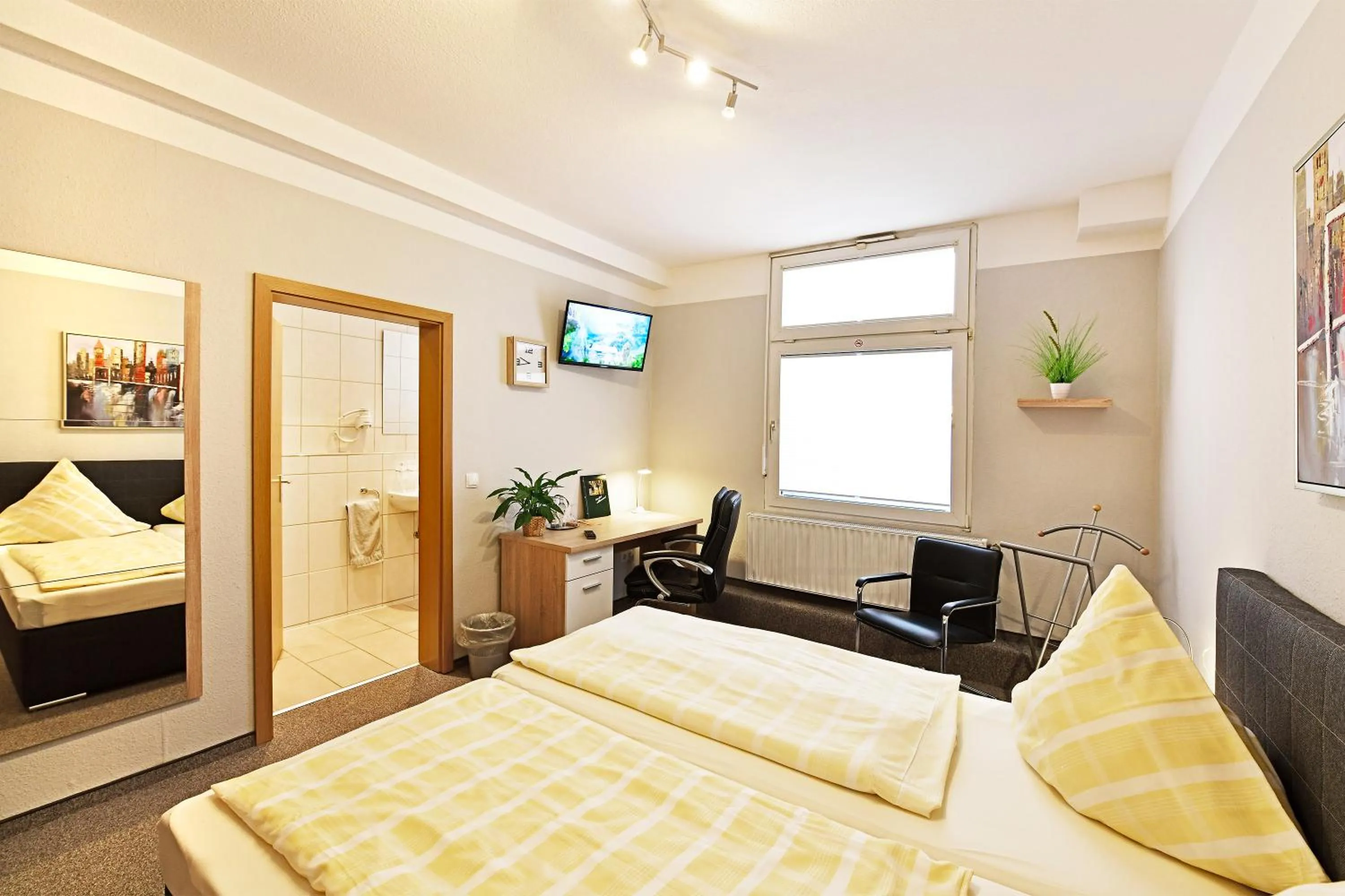 Bed in Hotel Haus Kleimann-Reuer