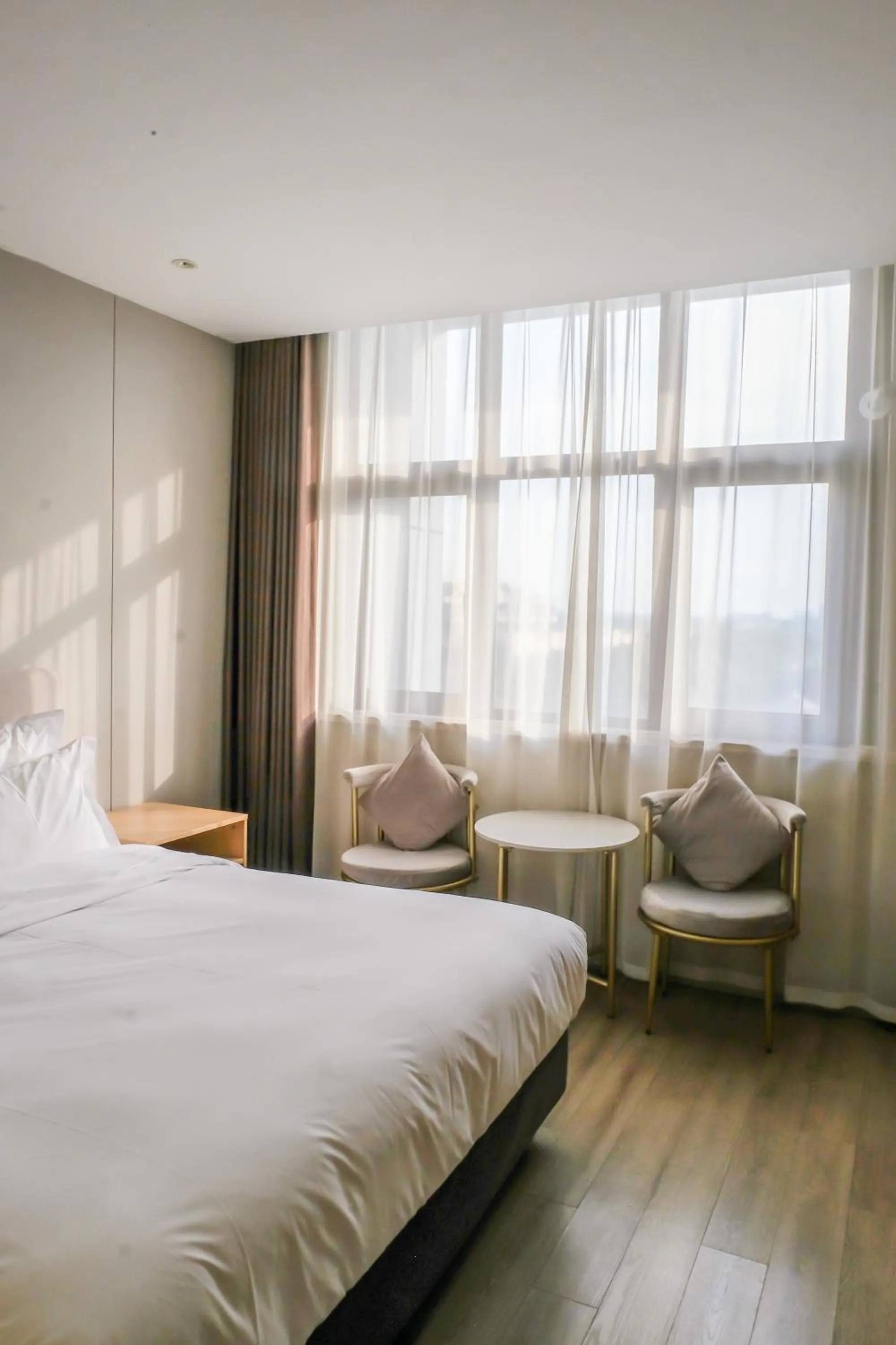 Bed in Shanghai JOYFUL YARD Hotel-Free shuttle bus to Pudong Airport and Disneyland