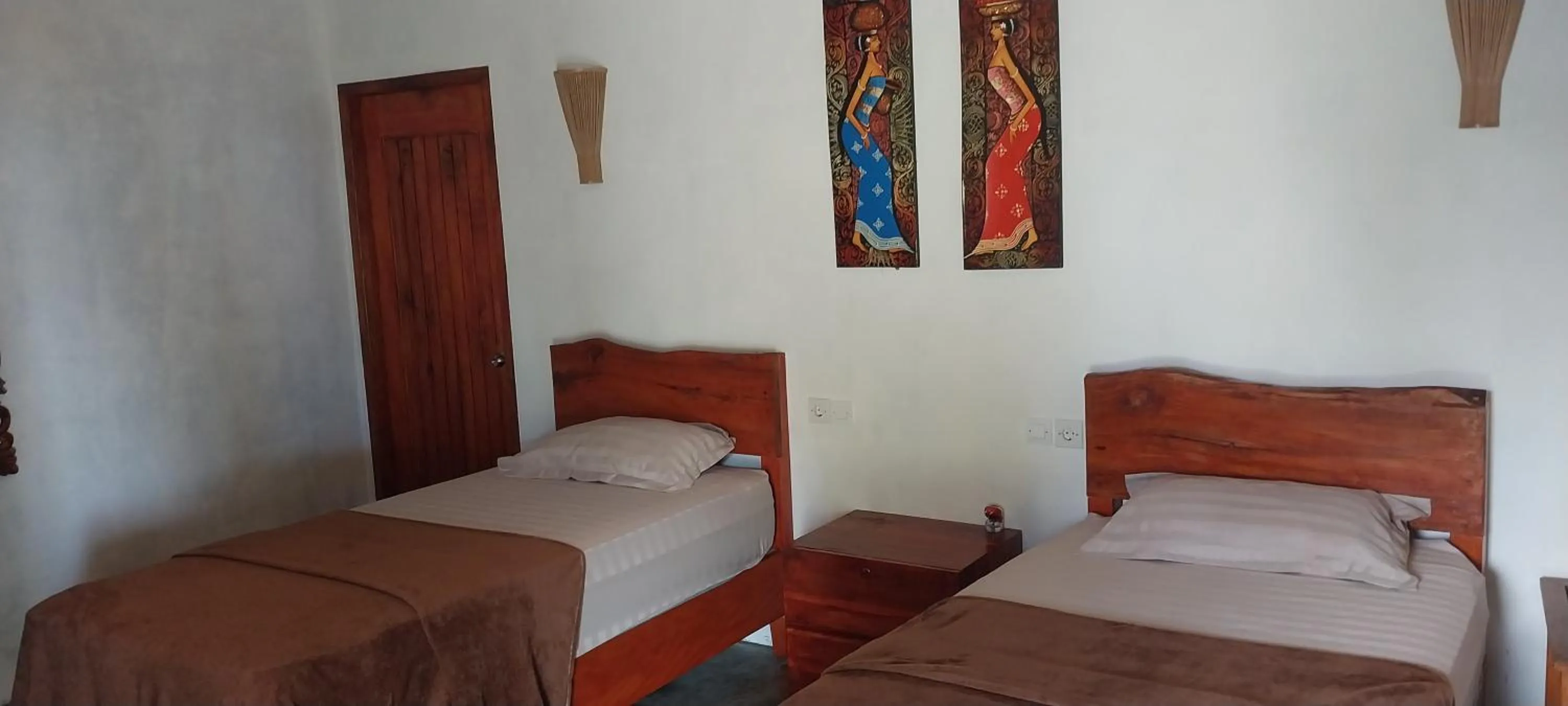 Bed in Kambuna Bungalow