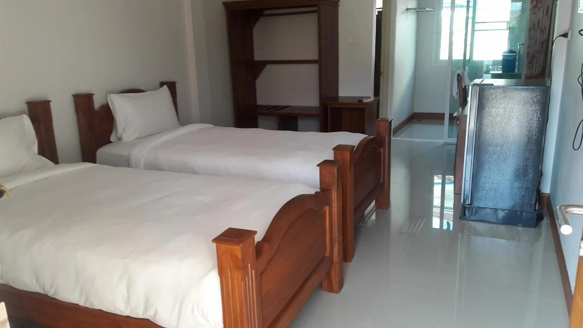 Bed in Suksopha Resort