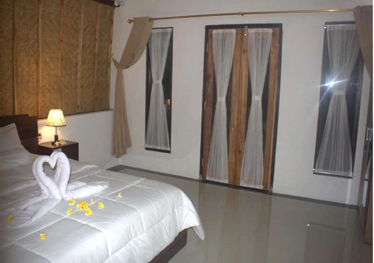 Bed in Sebrang Hills Bungalow