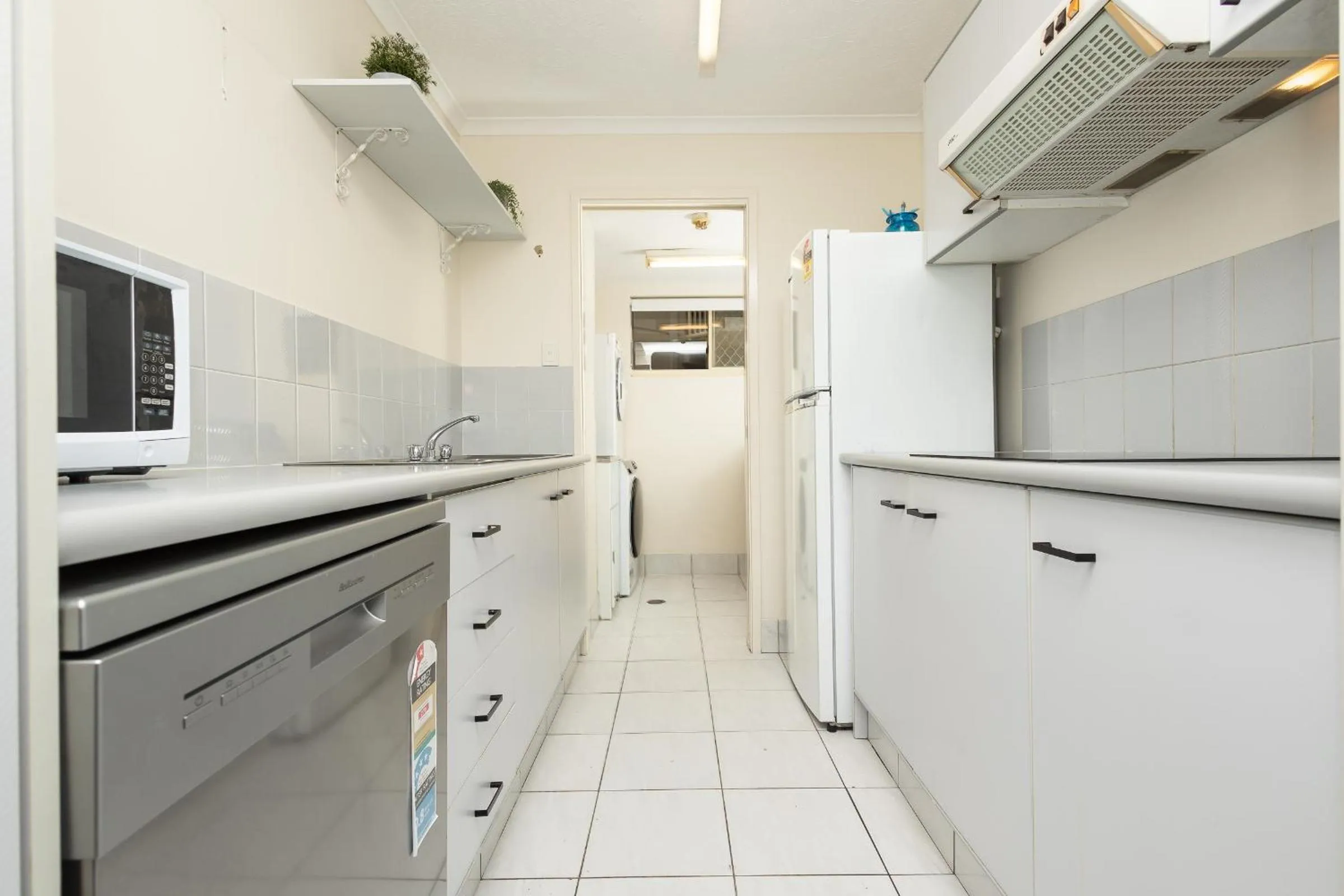 kitchen in Bayview Beach Holiday Apartments