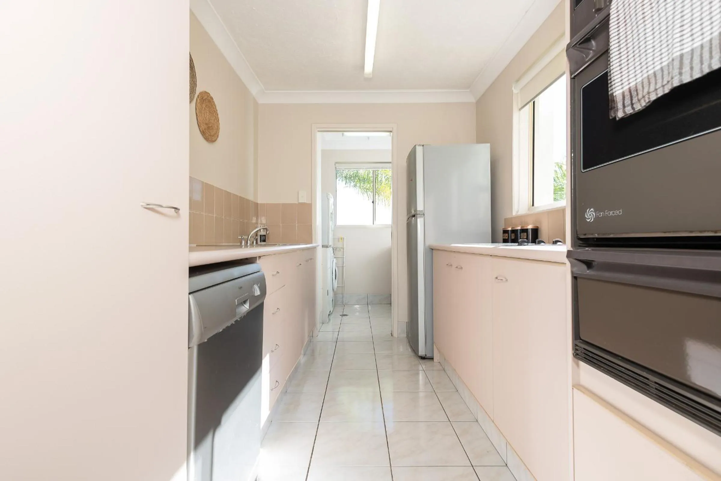 kitchen in Bayview Beach Holiday Apartments