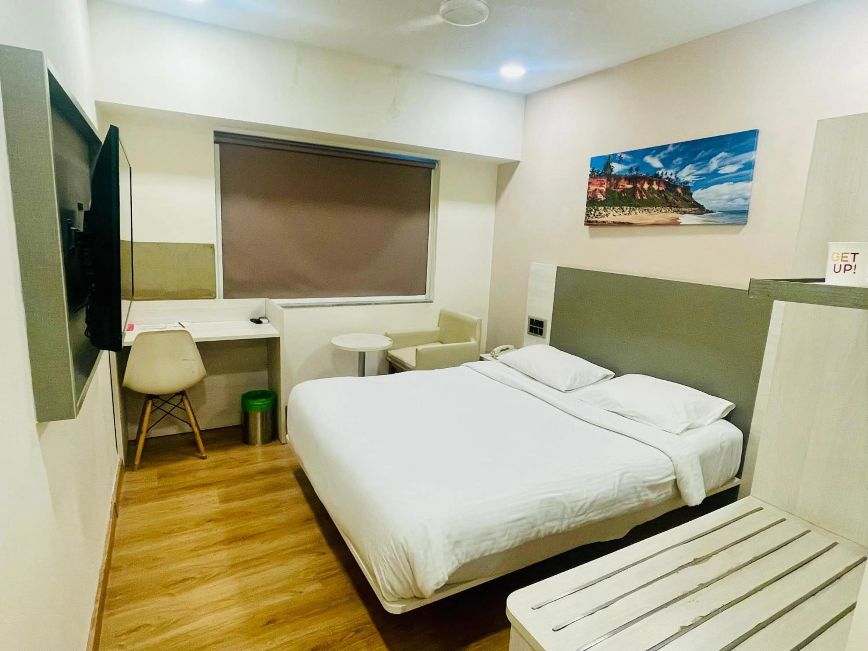 Photo of the whole room, Bed in Ginger Trivandrum