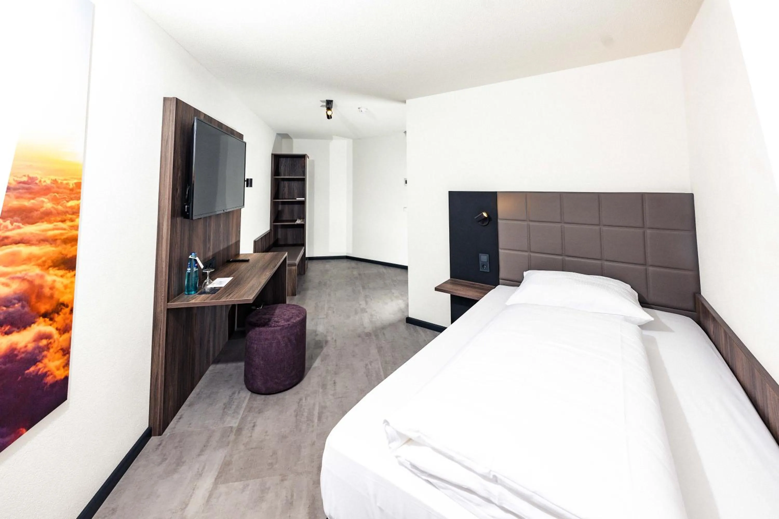 Photo of the whole room, Bed in Concorde Hotel am Flugplatz