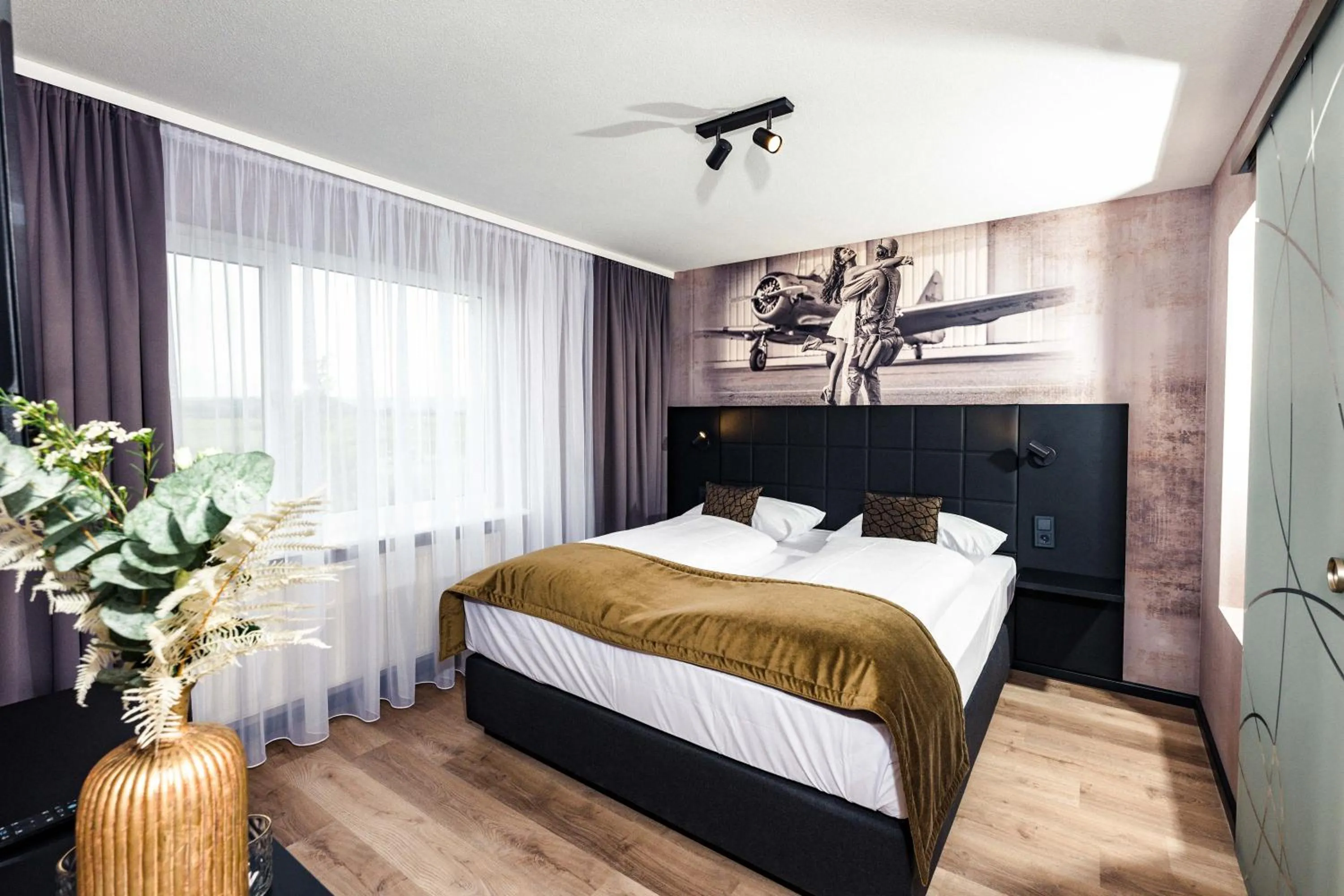 Photo of the whole room, Bed in Concorde Hotel am Flugplatz