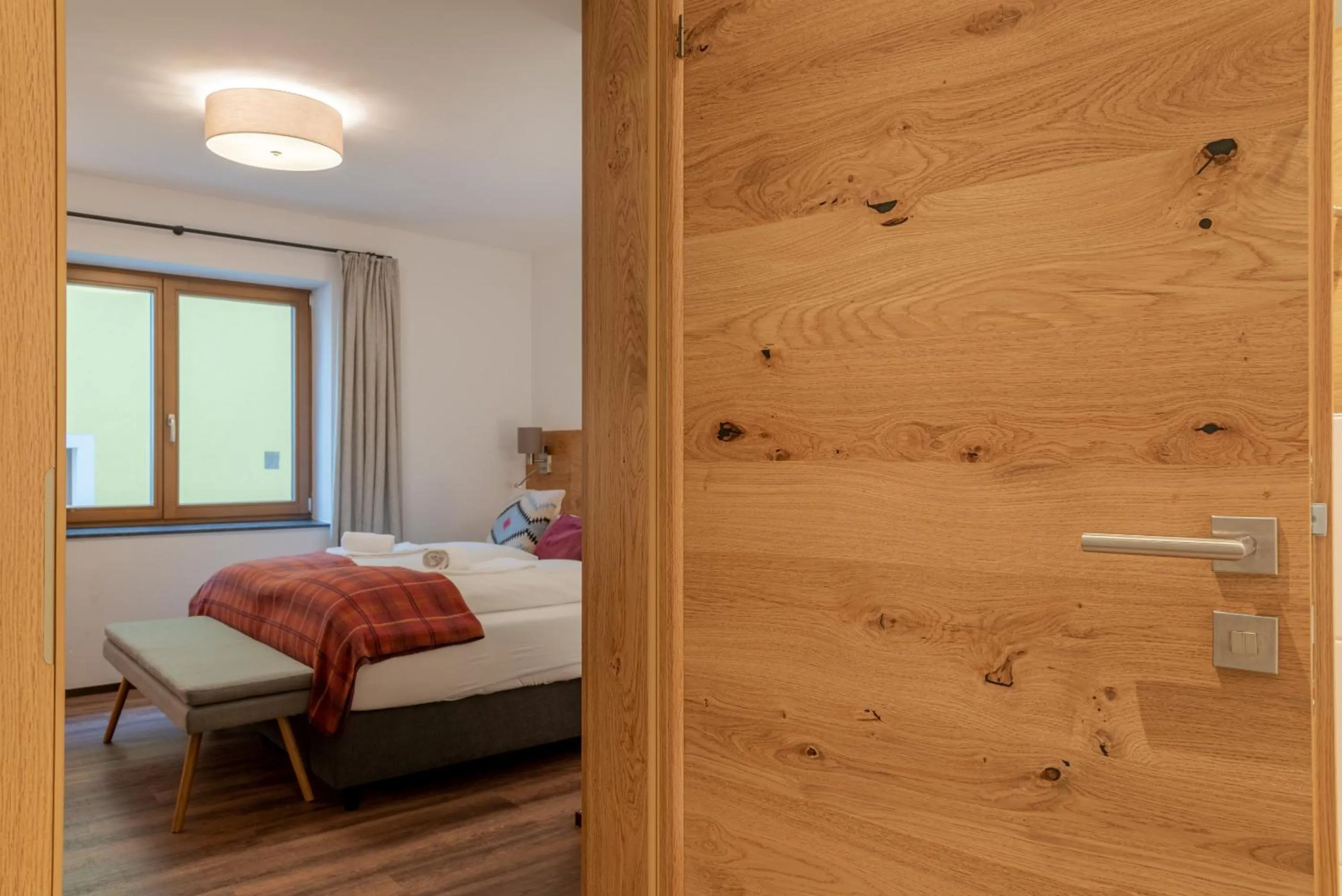 Bedroom, Bed in Finest Villa Zell am See by All in One Apartments incl SUMMER CARD
