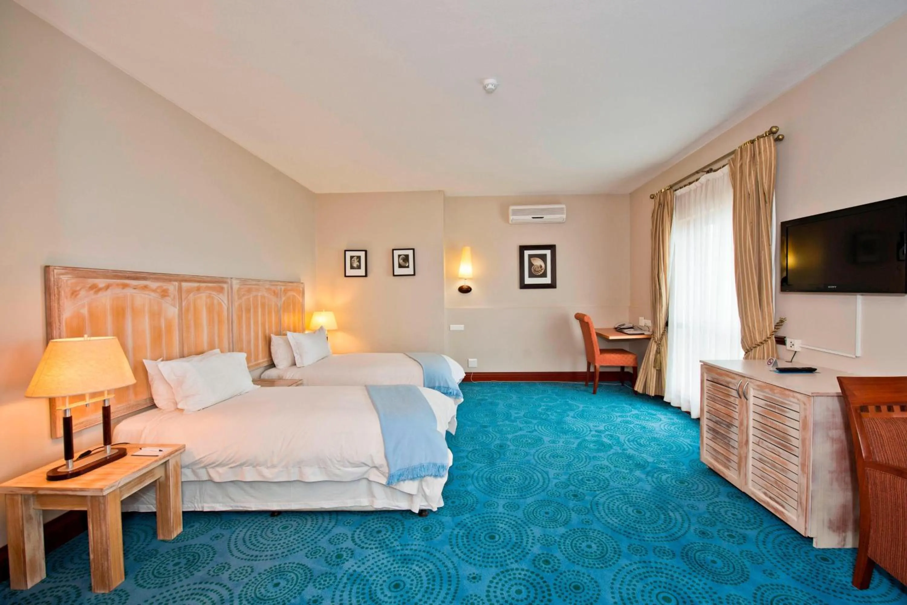 Photo of the whole room, Bed in Protea Hotel by Marriott Walvis Bay Pelican Bay