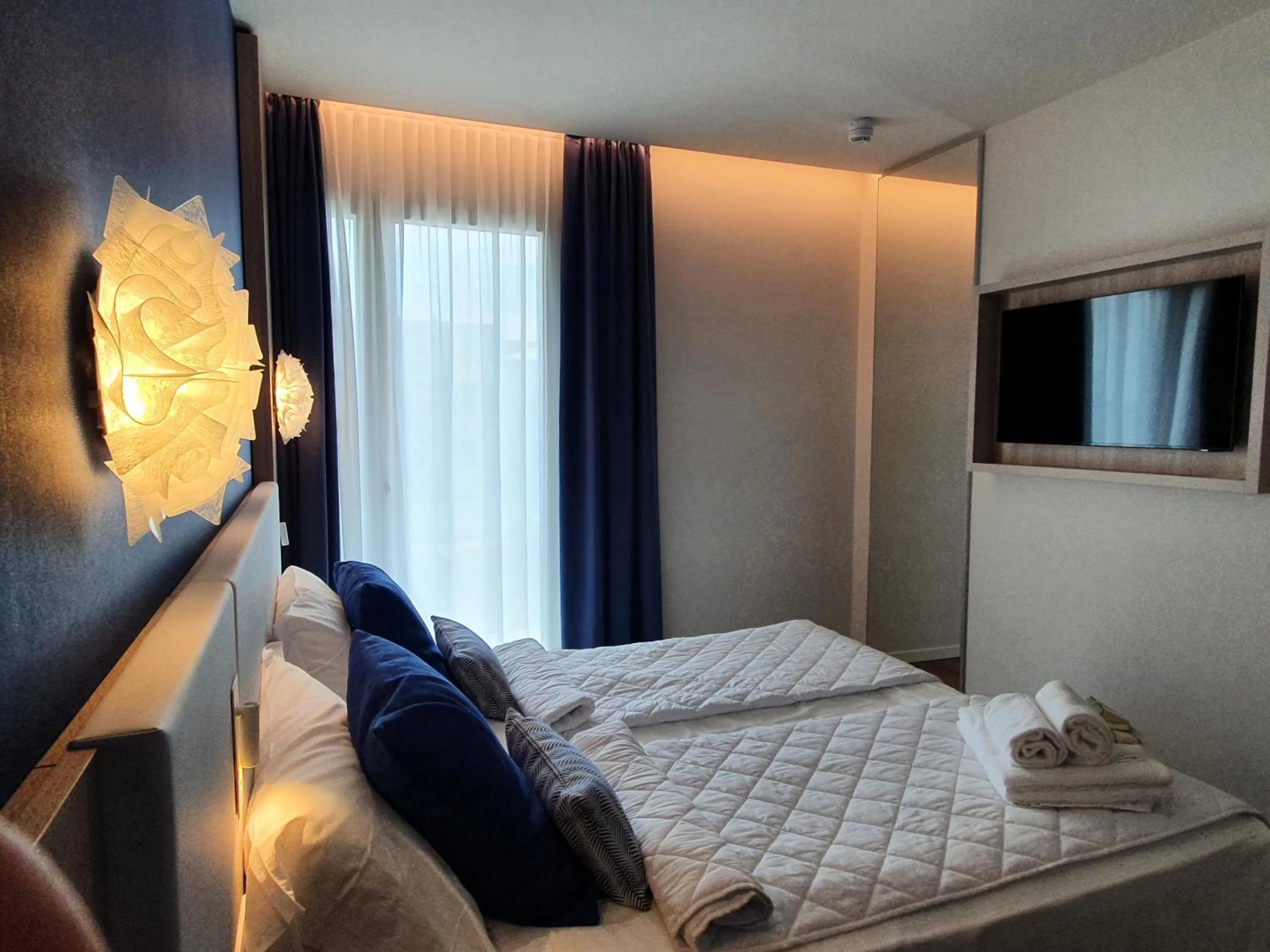 Bed in Hotel Galassia Suites & Spa