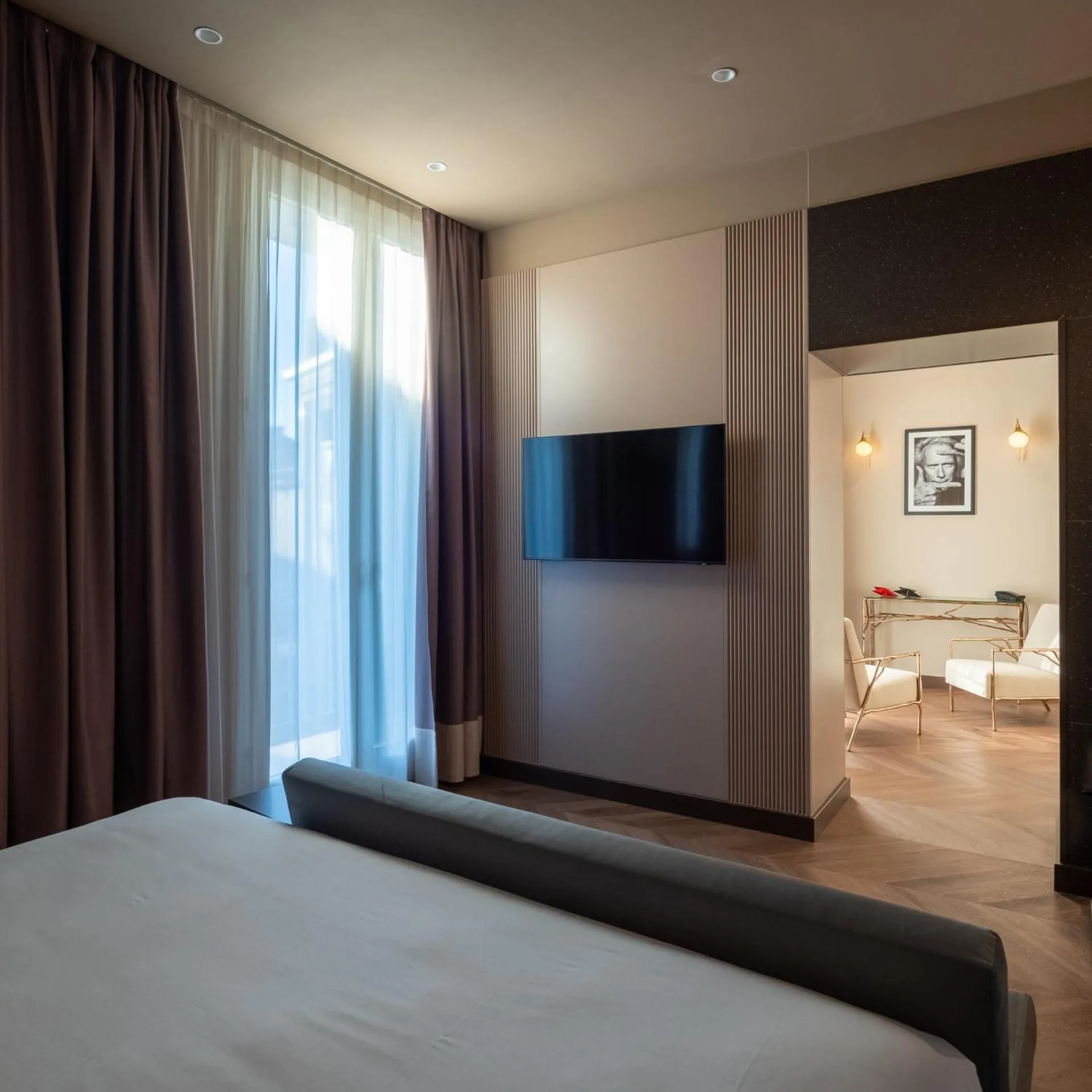 Bed in The Glam Boutique Hotel & Apt