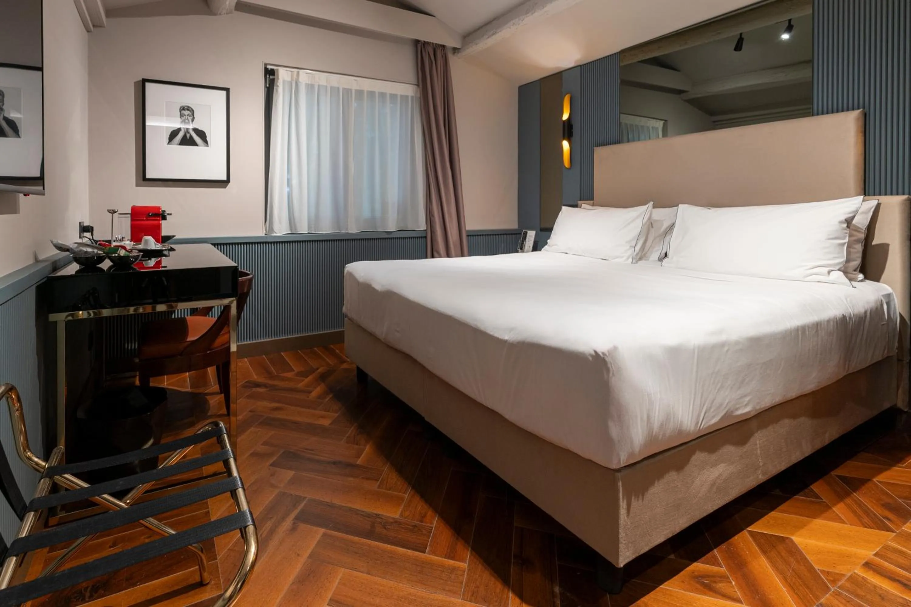 Bed in The Glam Boutique Hotel & Apt