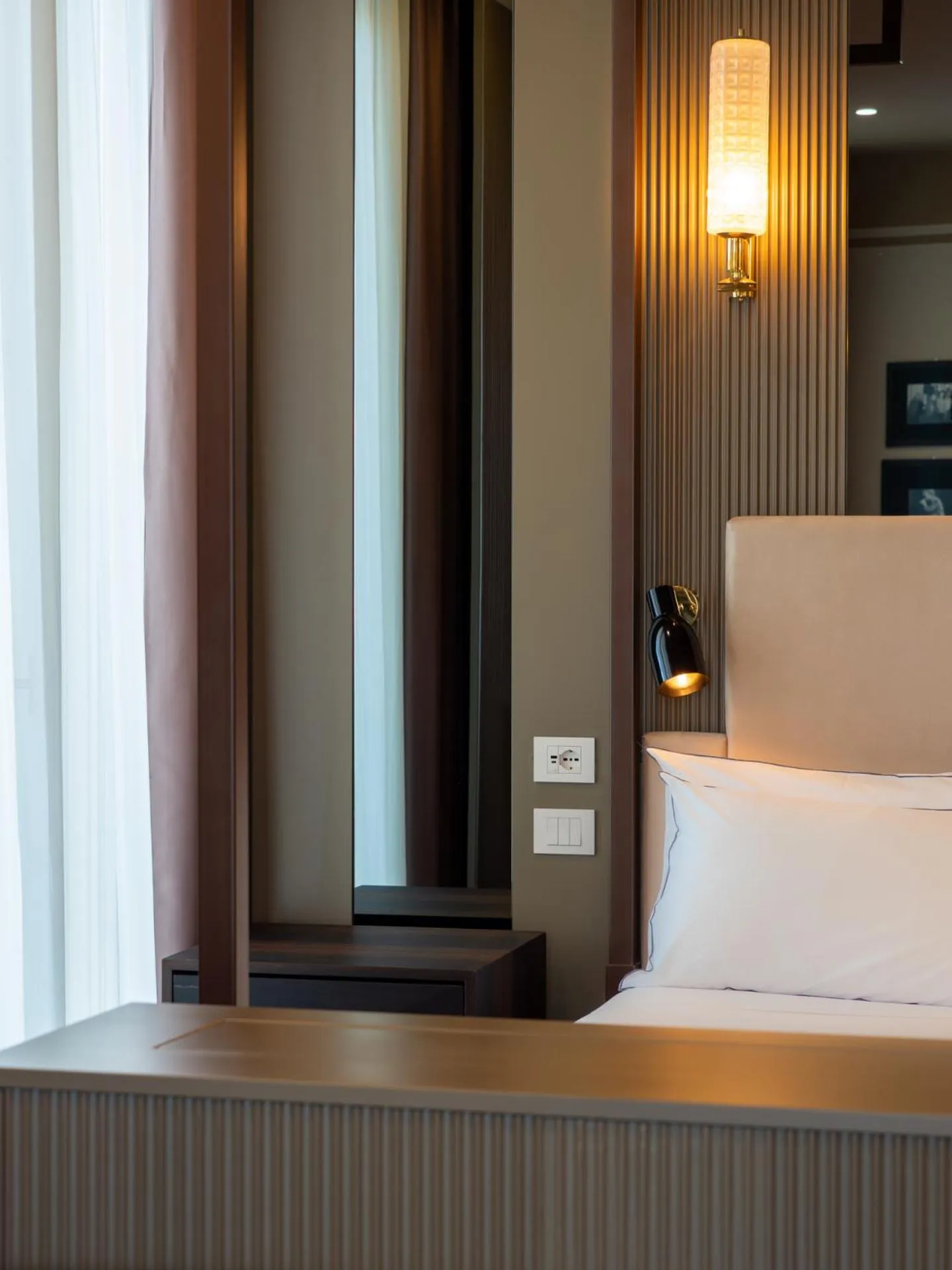 Bed in The Glam Boutique Hotel & Apt