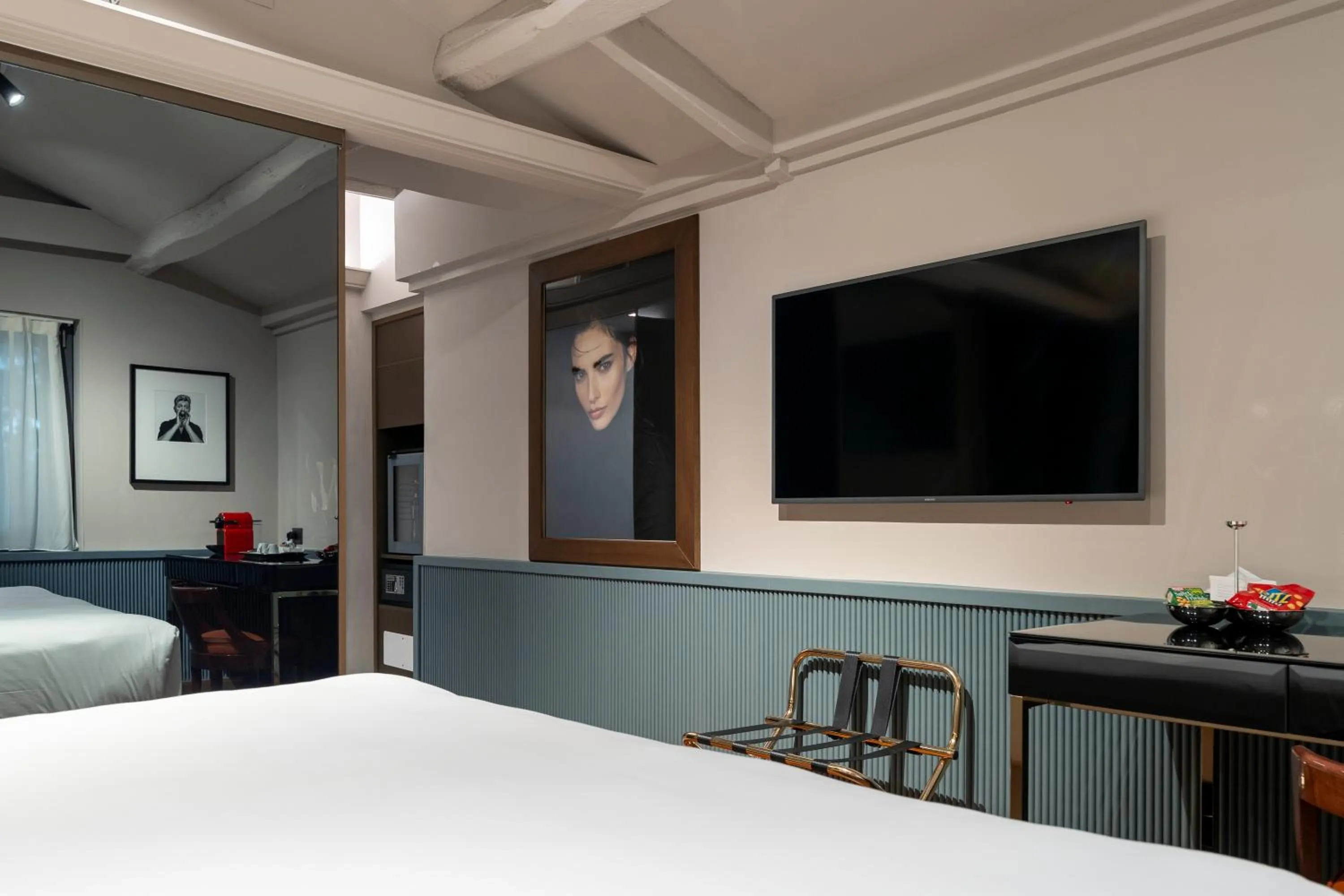 Bed in The Glam Boutique Hotel & Apt