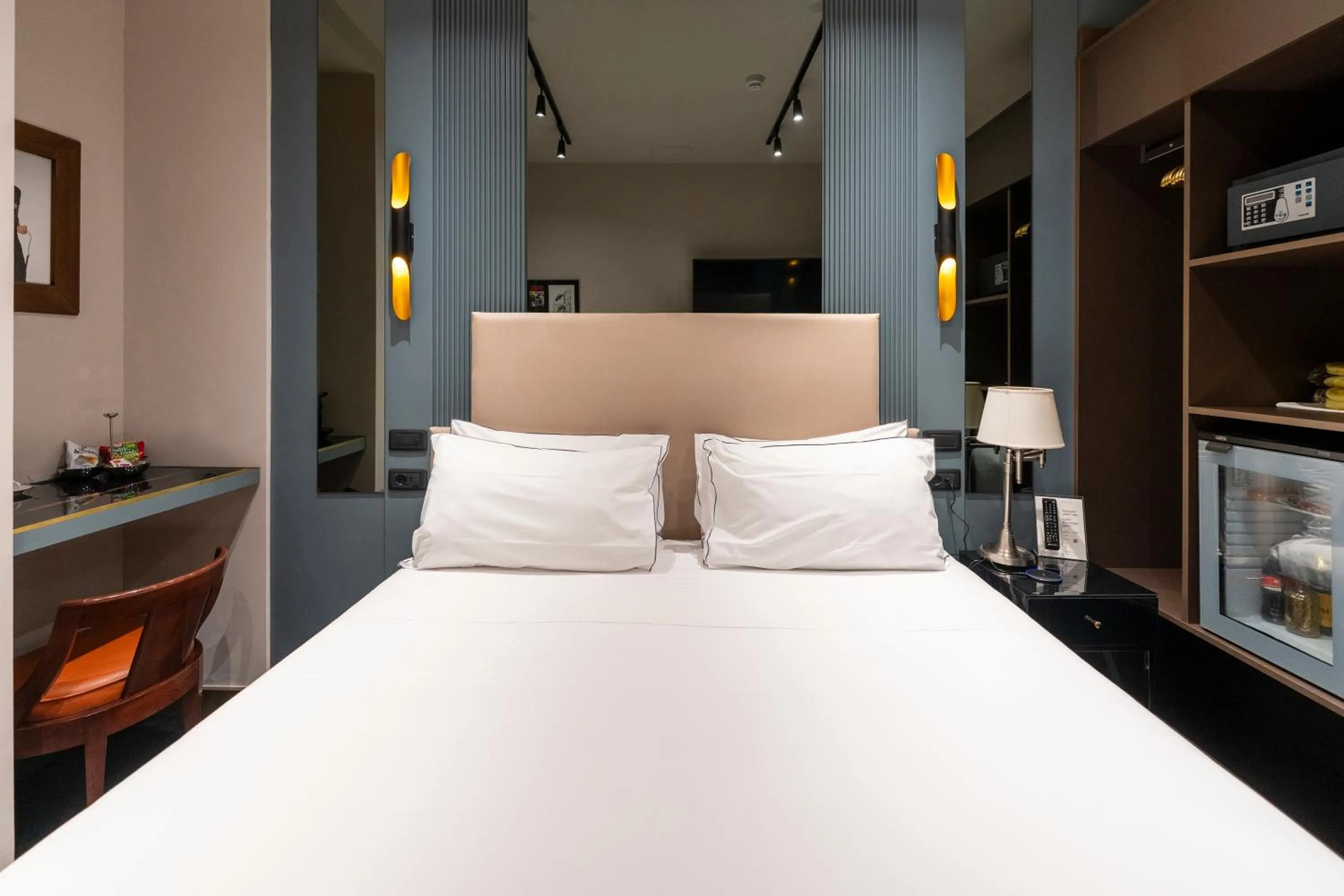 Bed in The Glam Boutique Hotel & Apt