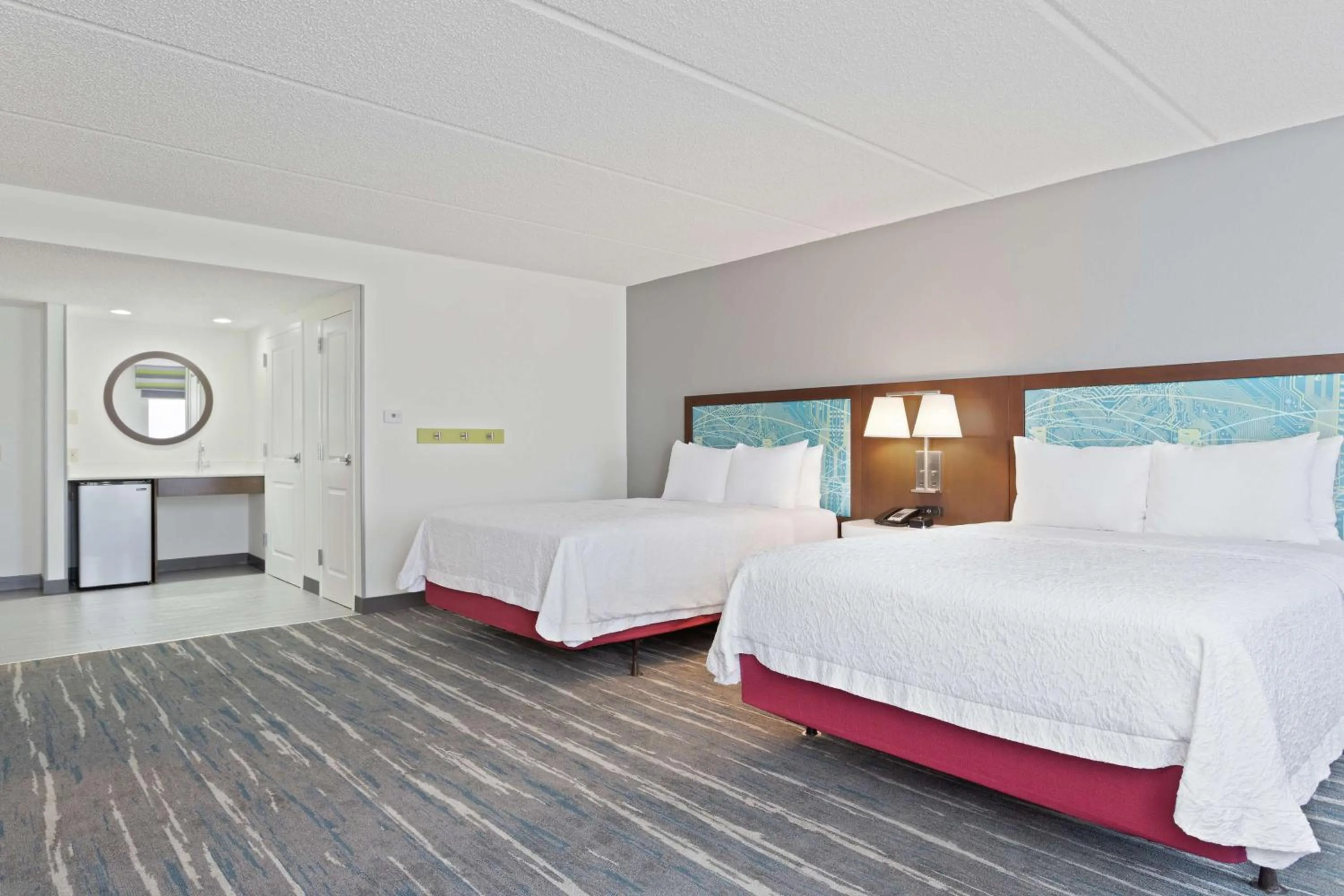 Bed in Hampton Inn & Suites Orlando International Drive North