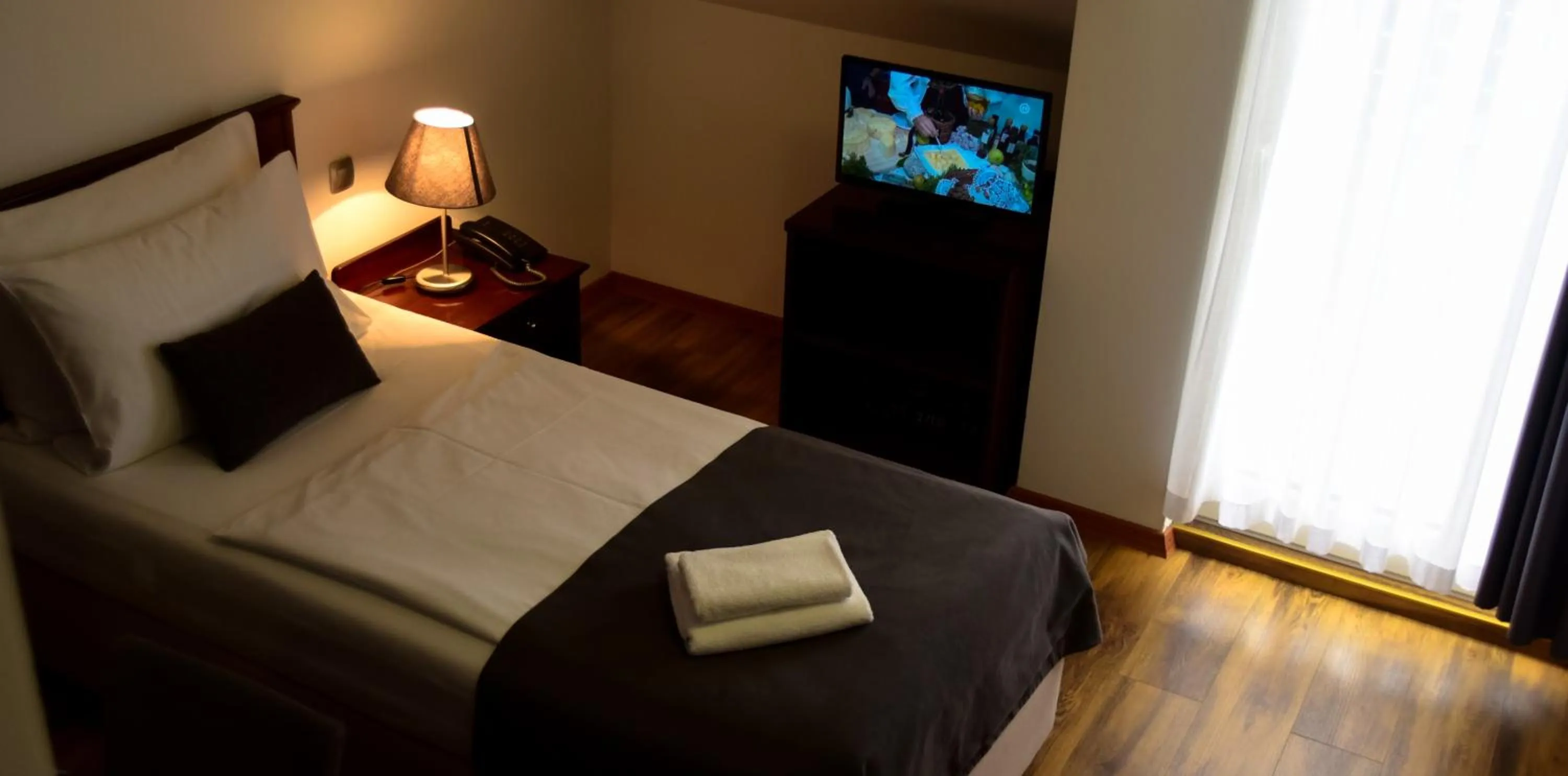 Bed in Hotel Meridijan16