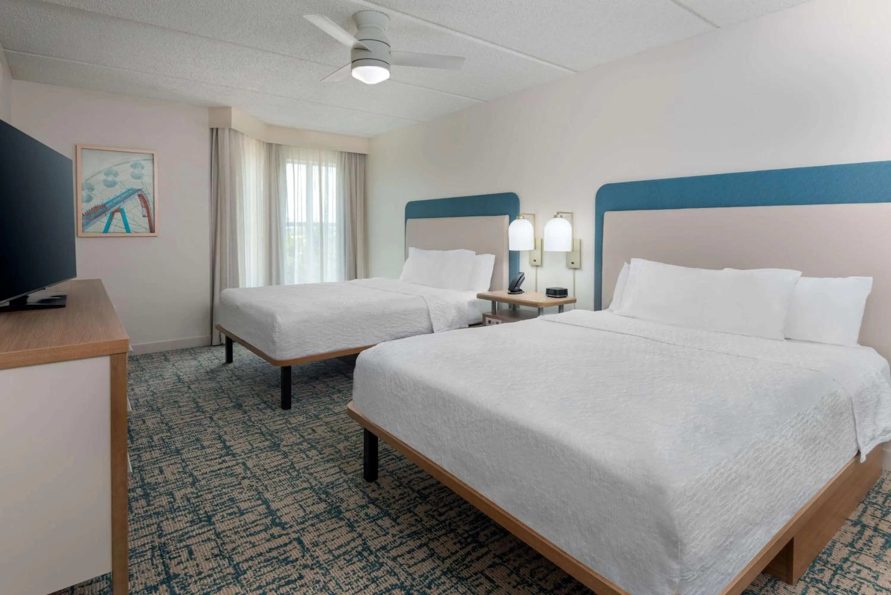 Bed in Homewood Suites by Hilton Orlando-Nearest to Universal Studios