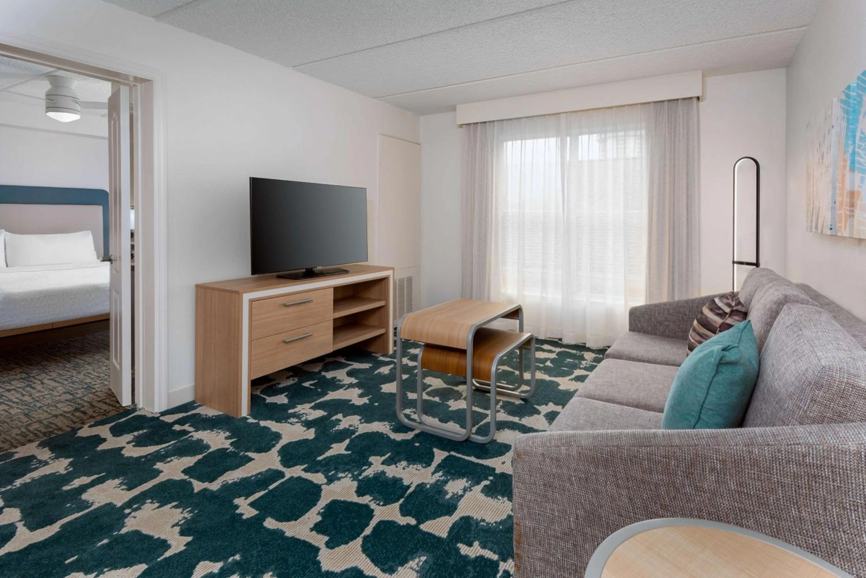 Living room, Bed in Homewood Suites by Hilton Orlando-Nearest to Universal Studios
