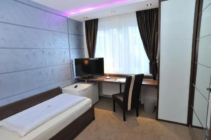 Bed in Hotel Bergischer Hof