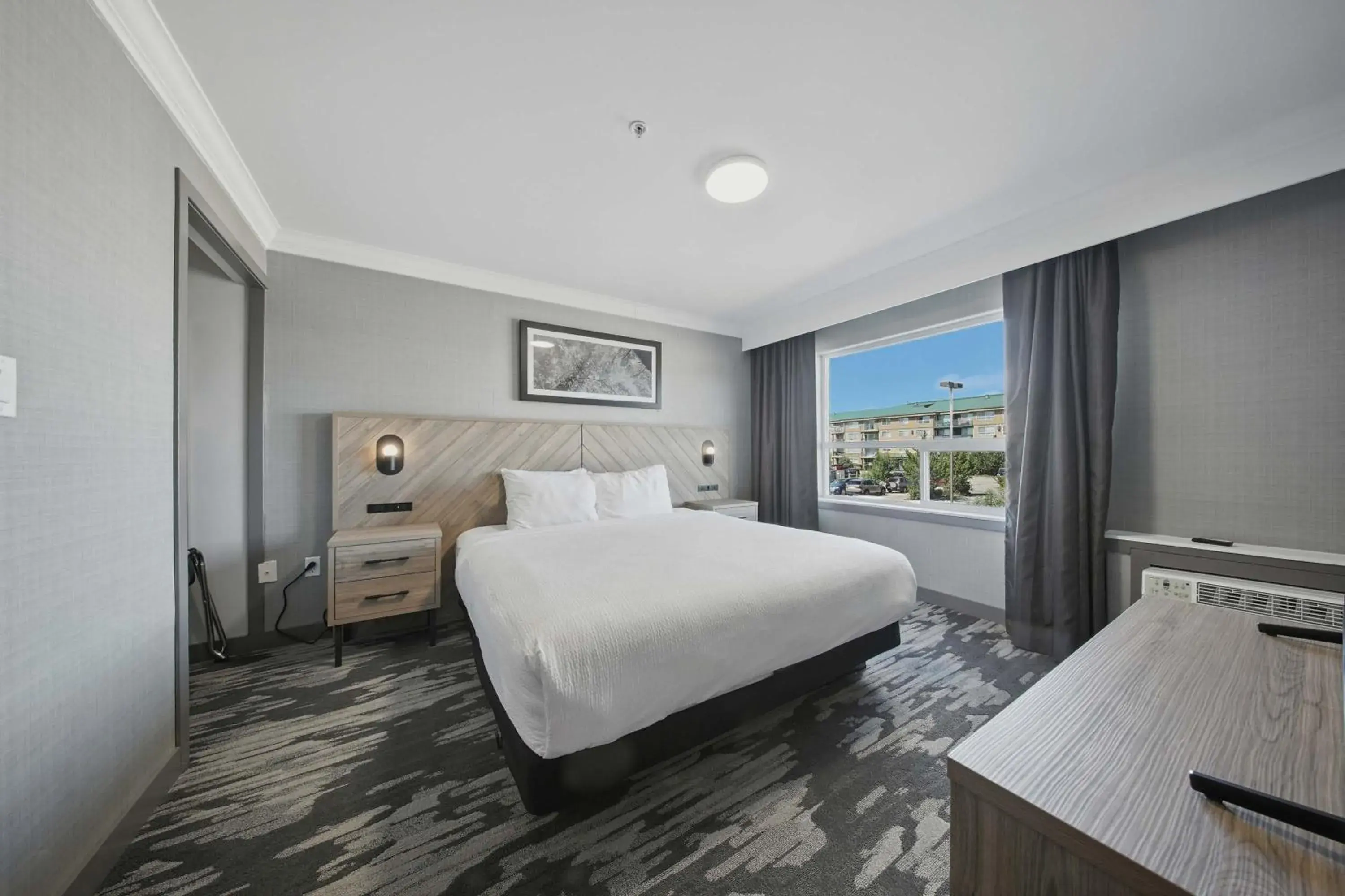 Grand Suite, 1 King Bed, Sofa Bed, Kitchenette in Sandman Hotel Red Deer Grand Suite, 1 King Bed, Sofa Bed, Kitchenette in Sandman Hotel Red Deer